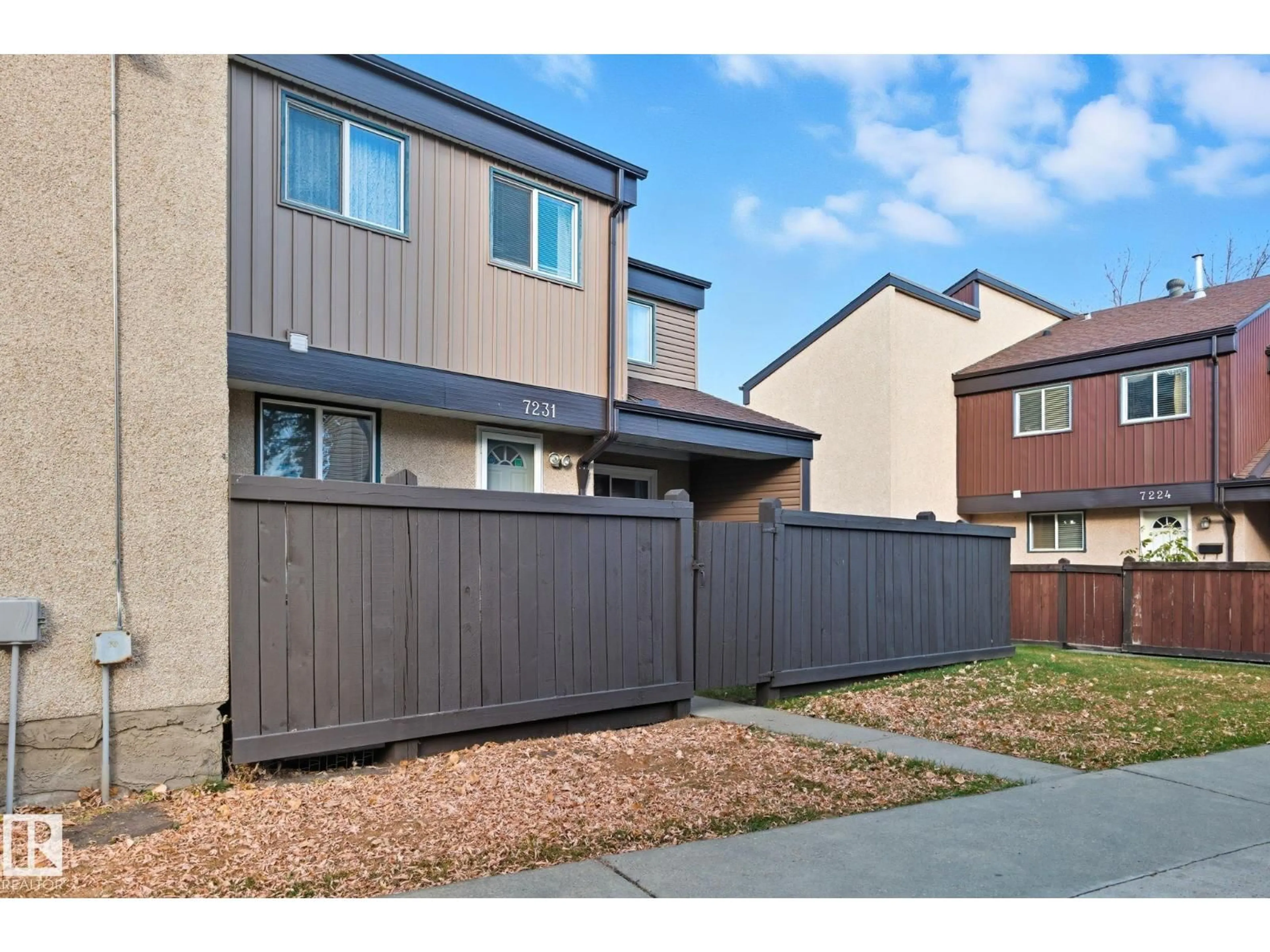 Home with vinyl exterior material, street for 7231 180 ST NW, Edmonton Alberta T5T3G1