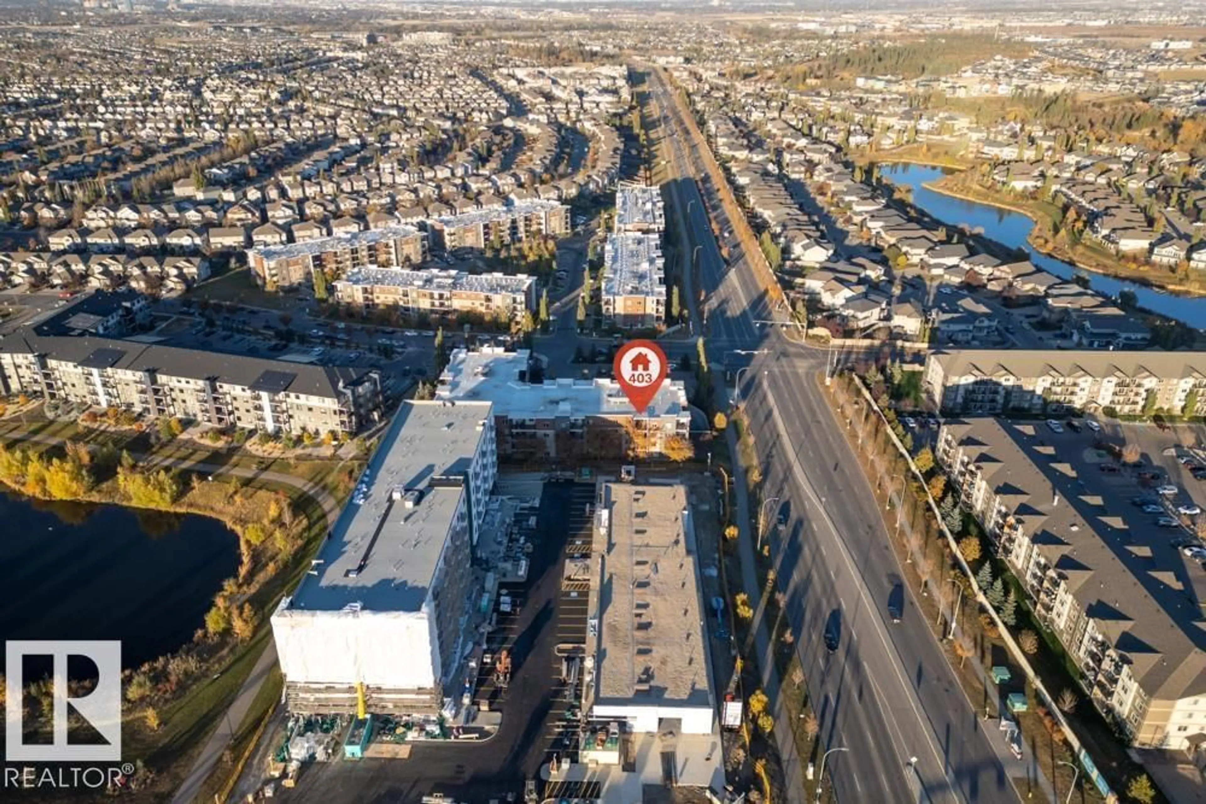 A pic from outside/outdoor area/front of a property/back of a property/a pic from drone, street for #403 - 11803 22 AV, Edmonton Alberta T6W2R9