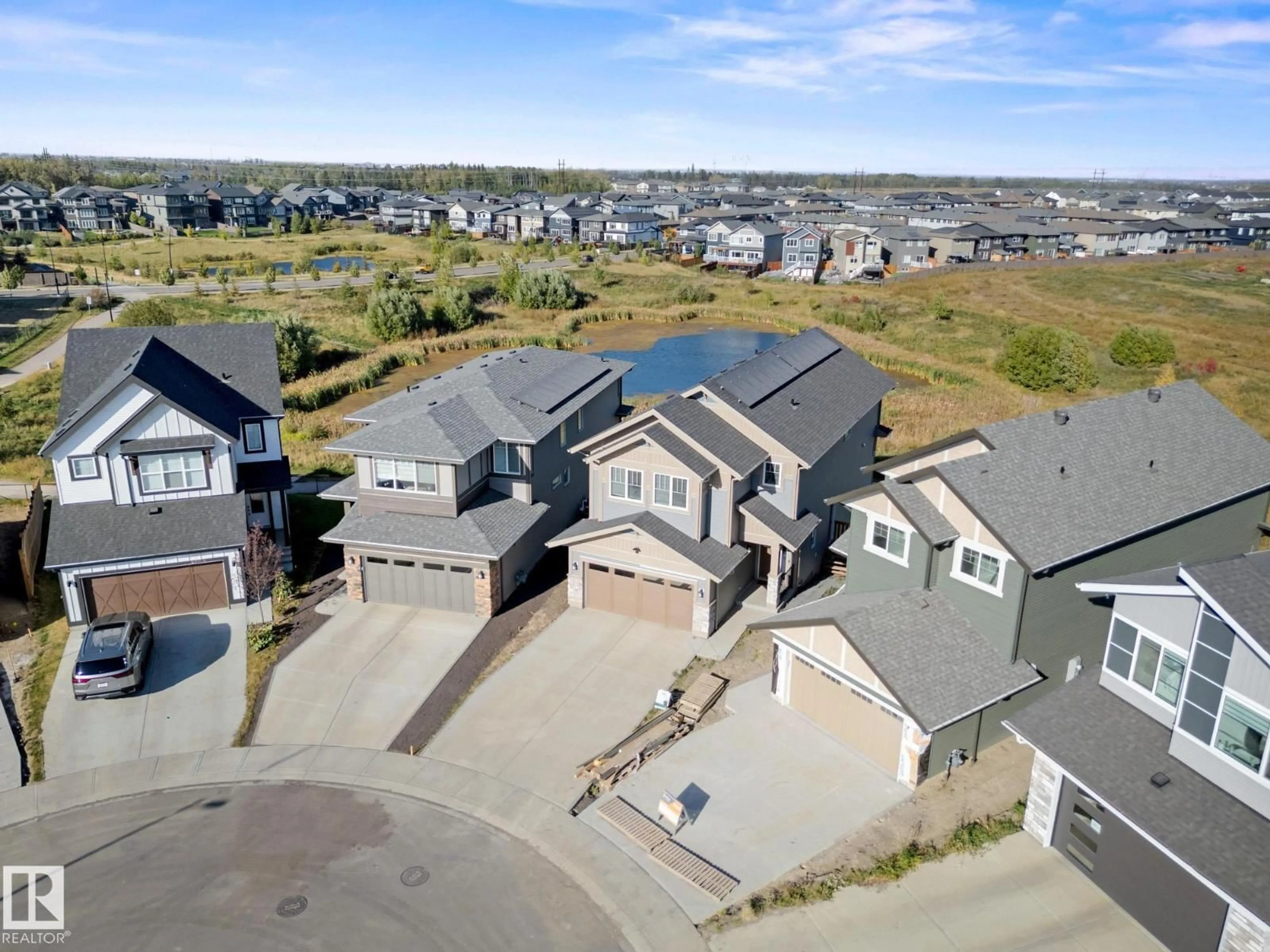 A pic from outside/outdoor area/front of a property/back of a property/a pic from drone, street for 20309 25A AV, Edmonton Alberta T6M1N8