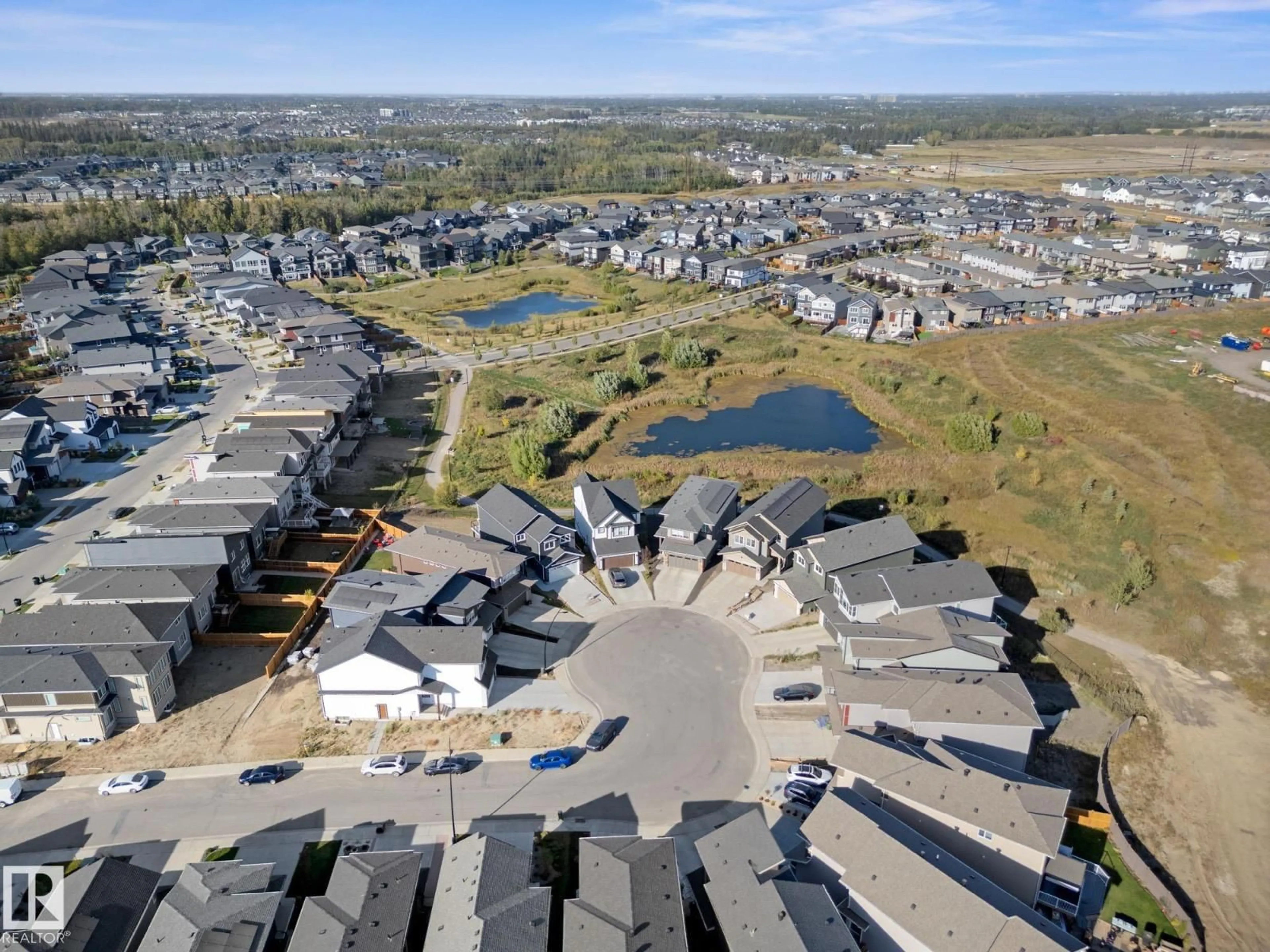 A pic from outside/outdoor area/front of a property/back of a property/a pic from drone, unknown for 20309 25A AV, Edmonton Alberta T6M1N8