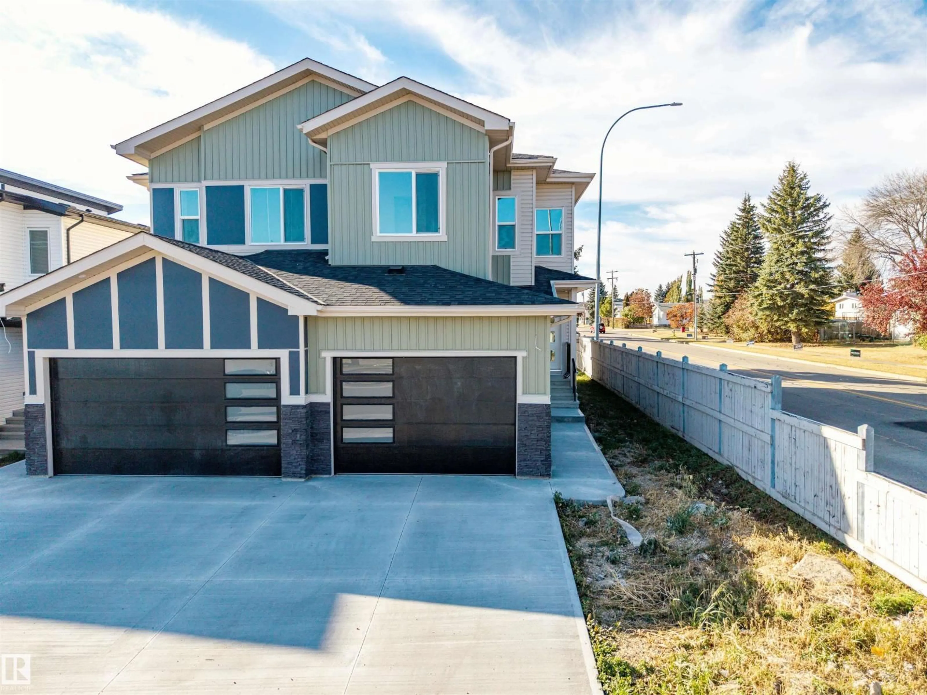 Home with vinyl exterior material, street for 4912 46 ST, Beaumont Alberta T6X1H9