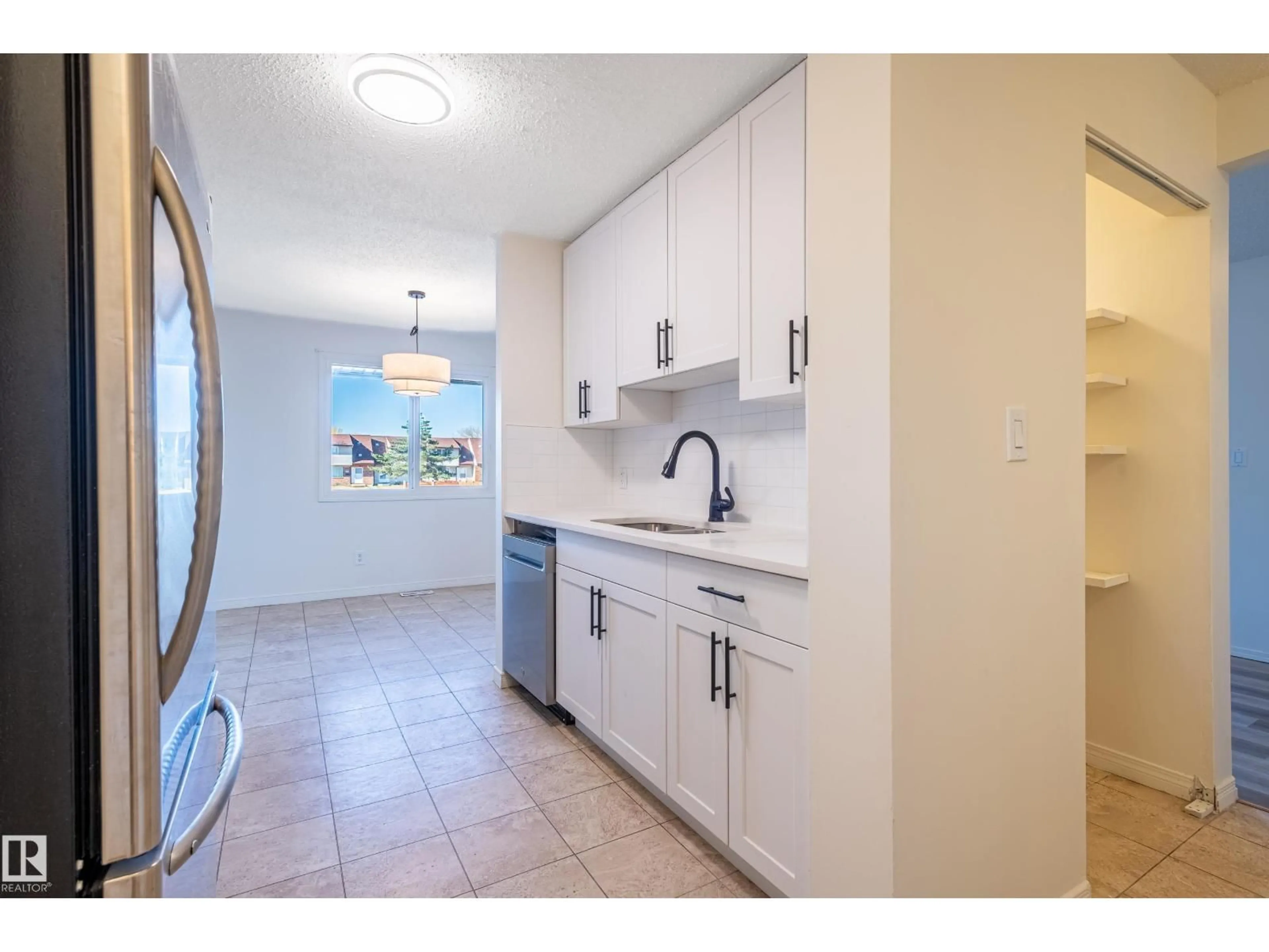 Standard kitchen, ceramic/tile floor for 13341 47 ST, Edmonton Alberta T5A1L8