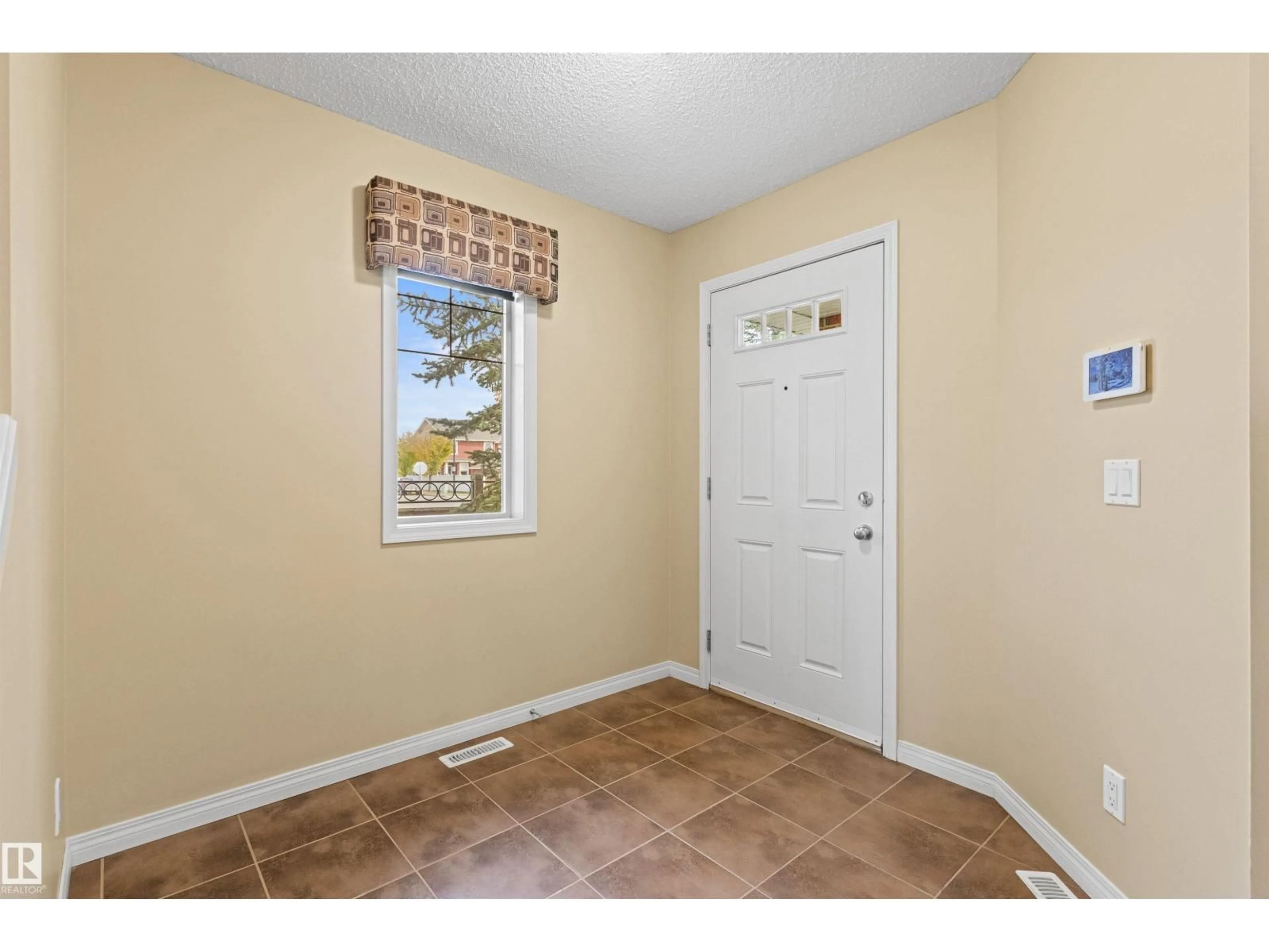 Indoor entryway for #63 - 1128 156 ST, Edmonton Alberta T6R0C9