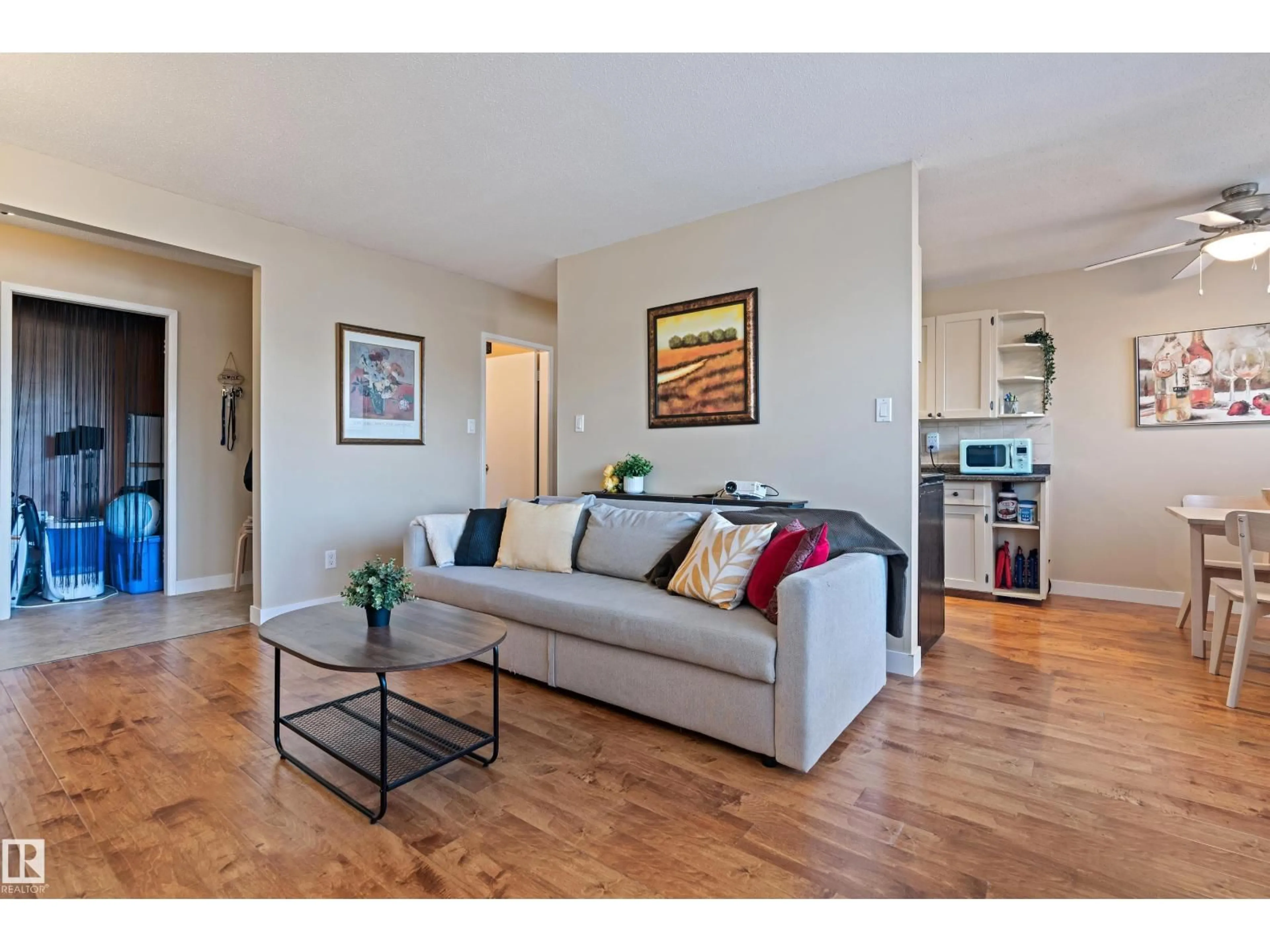 Living room with furniture, wood/laminate floor for #10 - 5635 105 ST, Edmonton Alberta T6H2N2