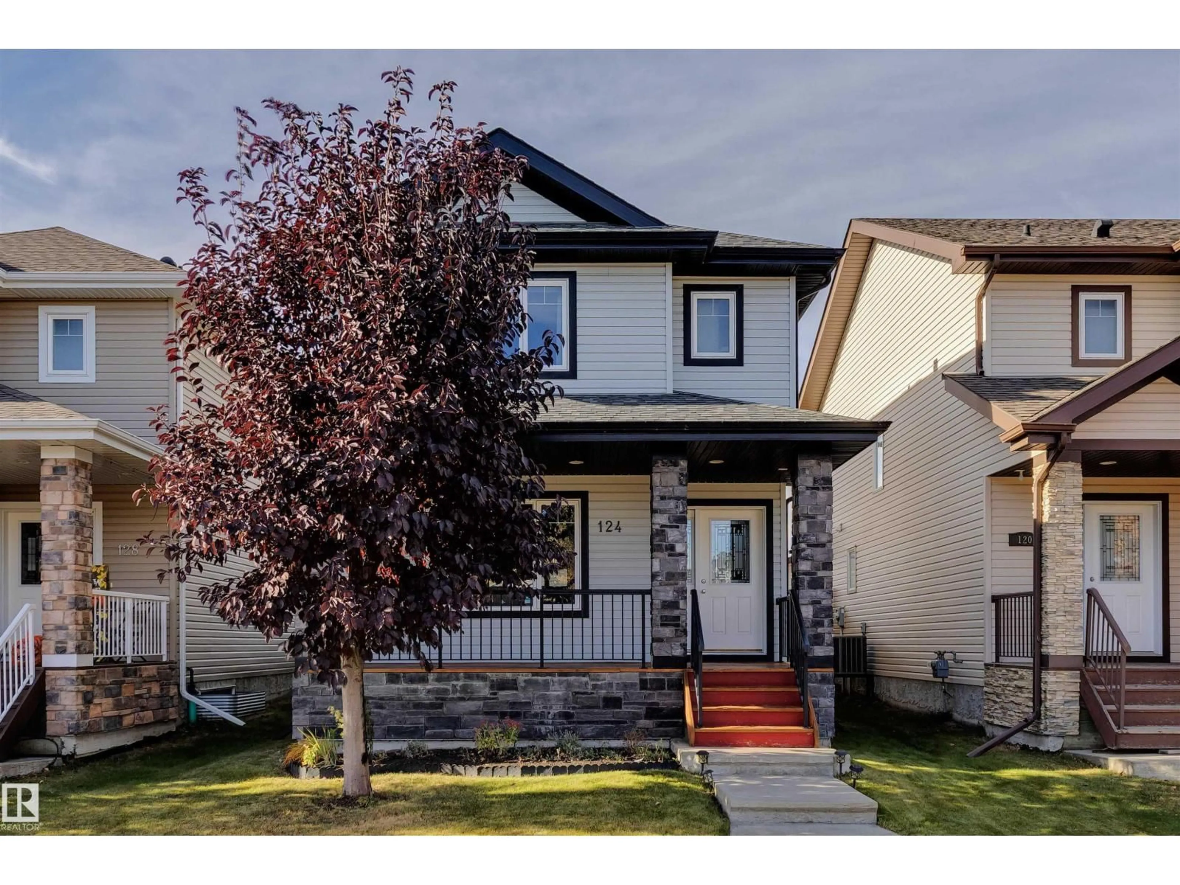 Home with vinyl exterior material, street for 124 ALLARD WY, Fort Saskatchewan Alberta T8L0N4