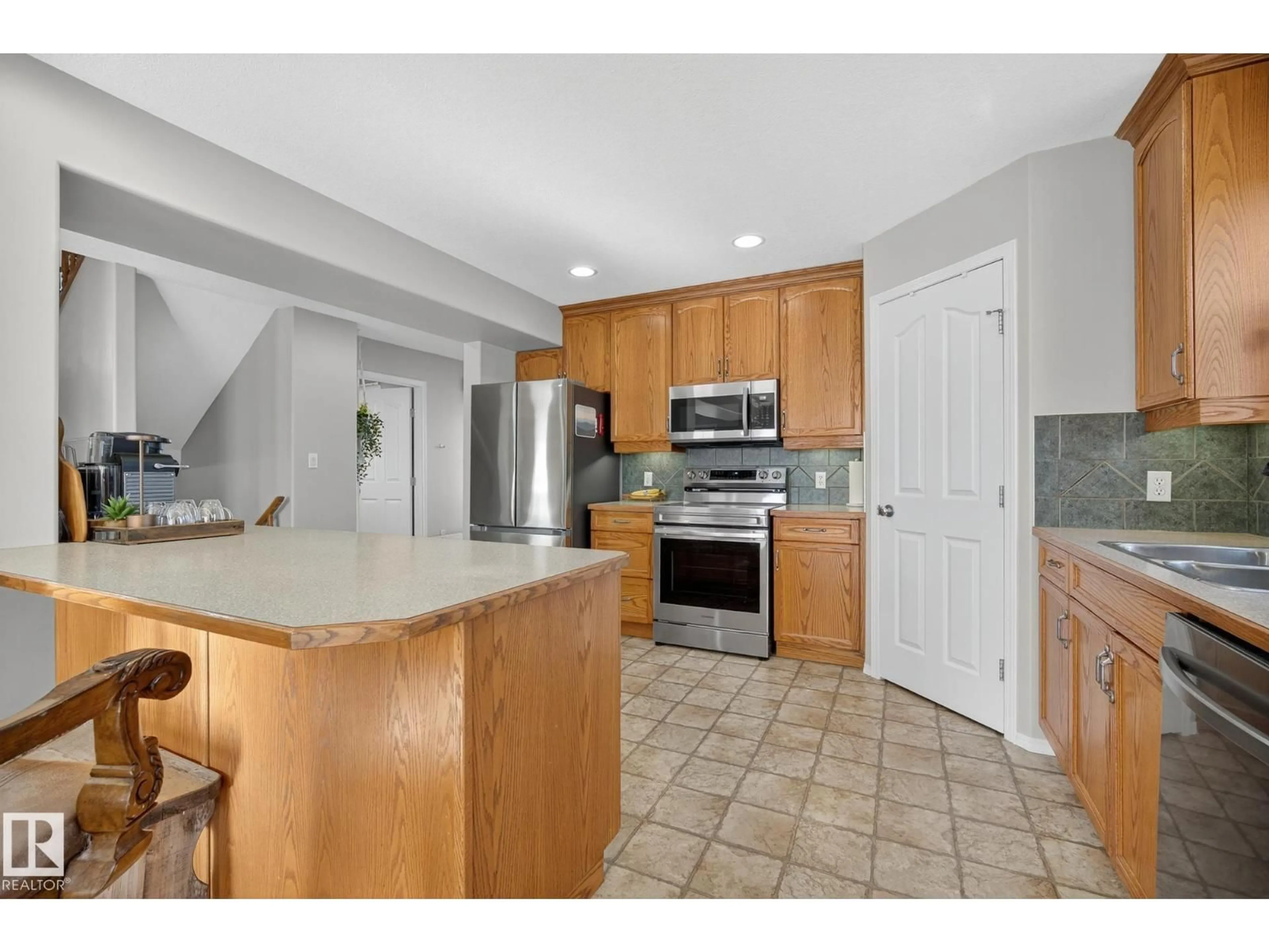 Open concept kitchen, ceramic/tile floor for #304 - 52349 RGE ROAD 222, Rural Strathcona County Alberta T8C1A4