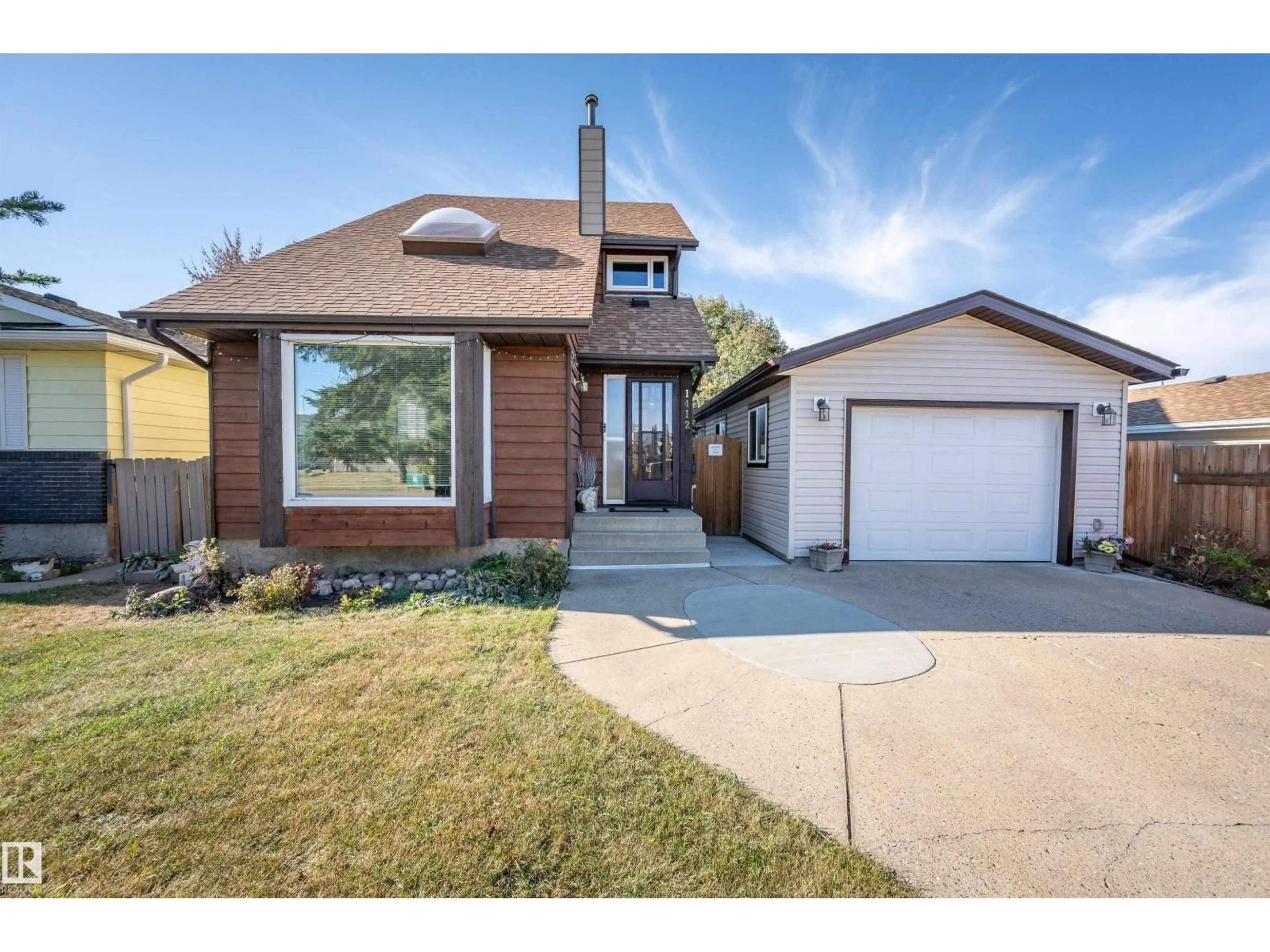 Home with brick exterior material, street for 1412 35 ST, Edmonton Alberta T6L3E8