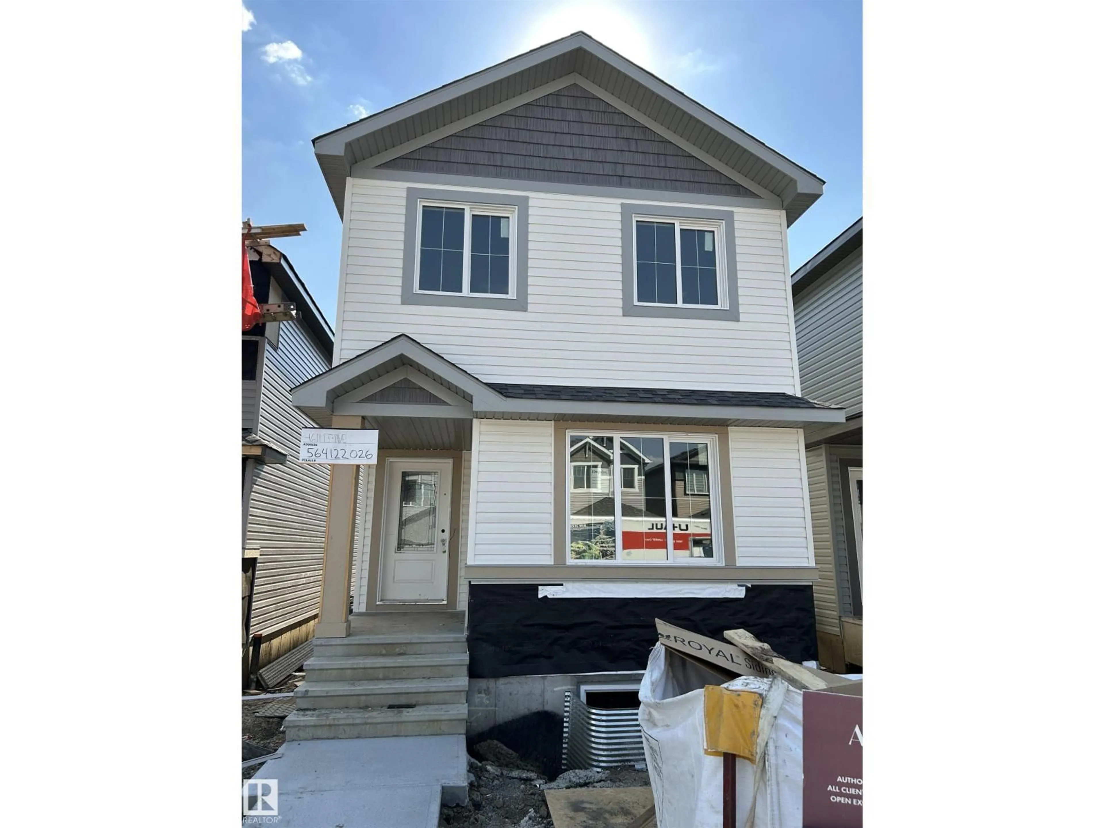 Home with vinyl exterior material, street for NW - 4611 177 AV, Edmonton Alberta T5Y4B7