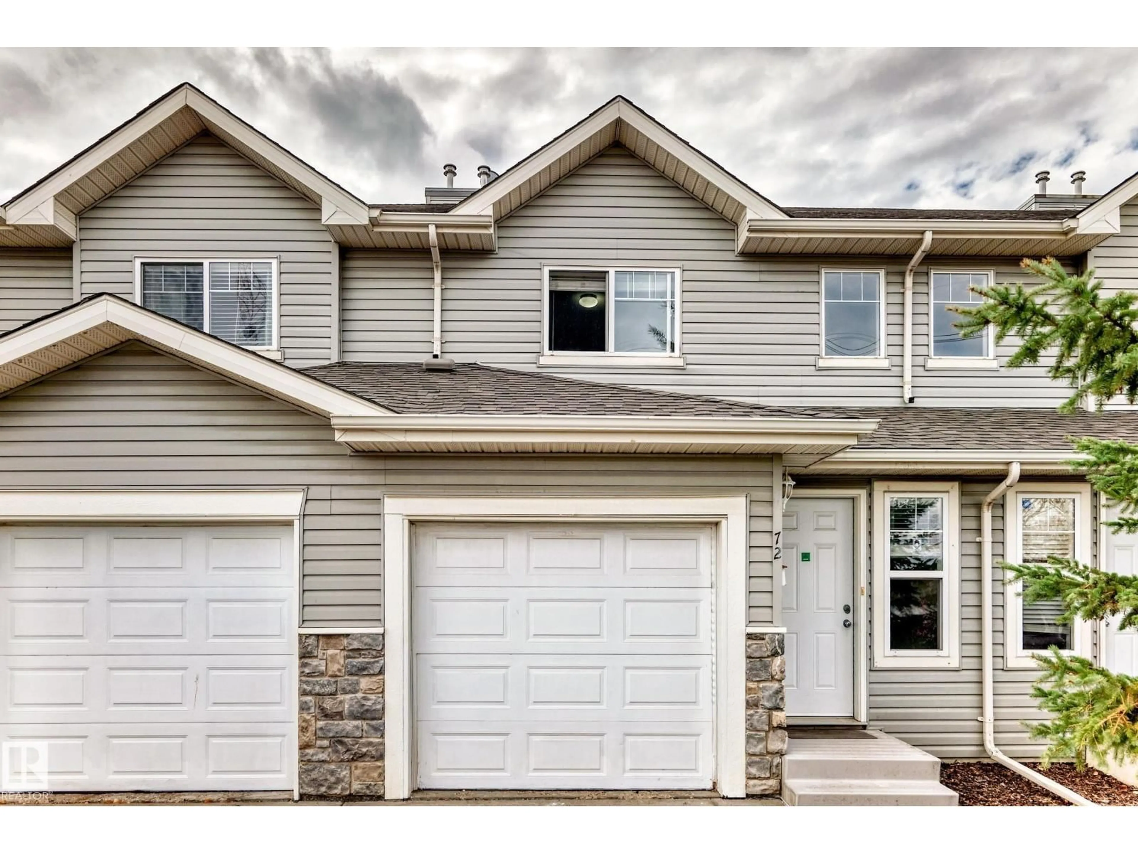 Home with vinyl exterior material, street for 230 - 72 EDWARDS DR, Edmonton Alberta T6X1G7