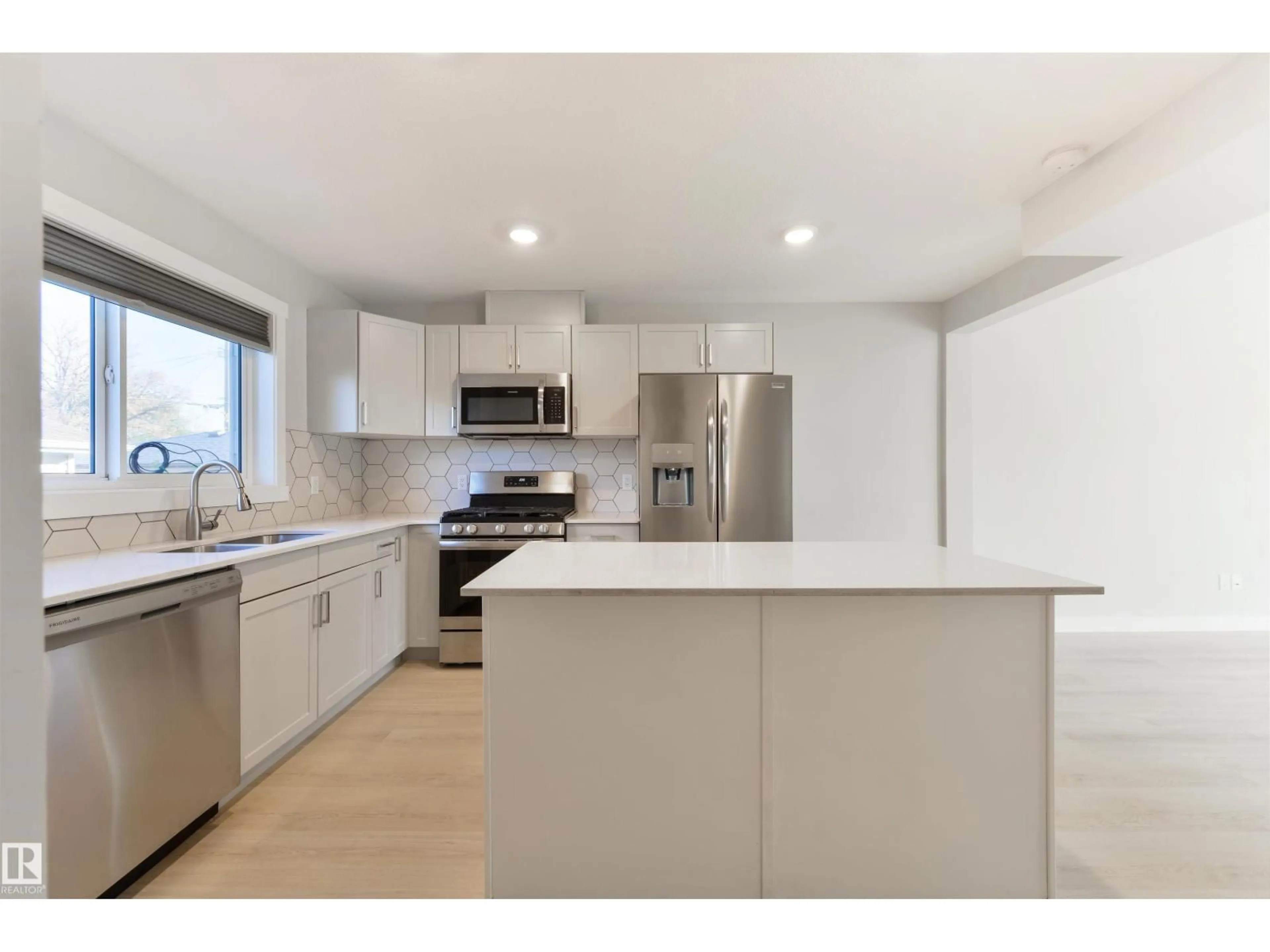 Open concept kitchen, unknown for 7942 82 AV, Edmonton Alberta T6C0Y2