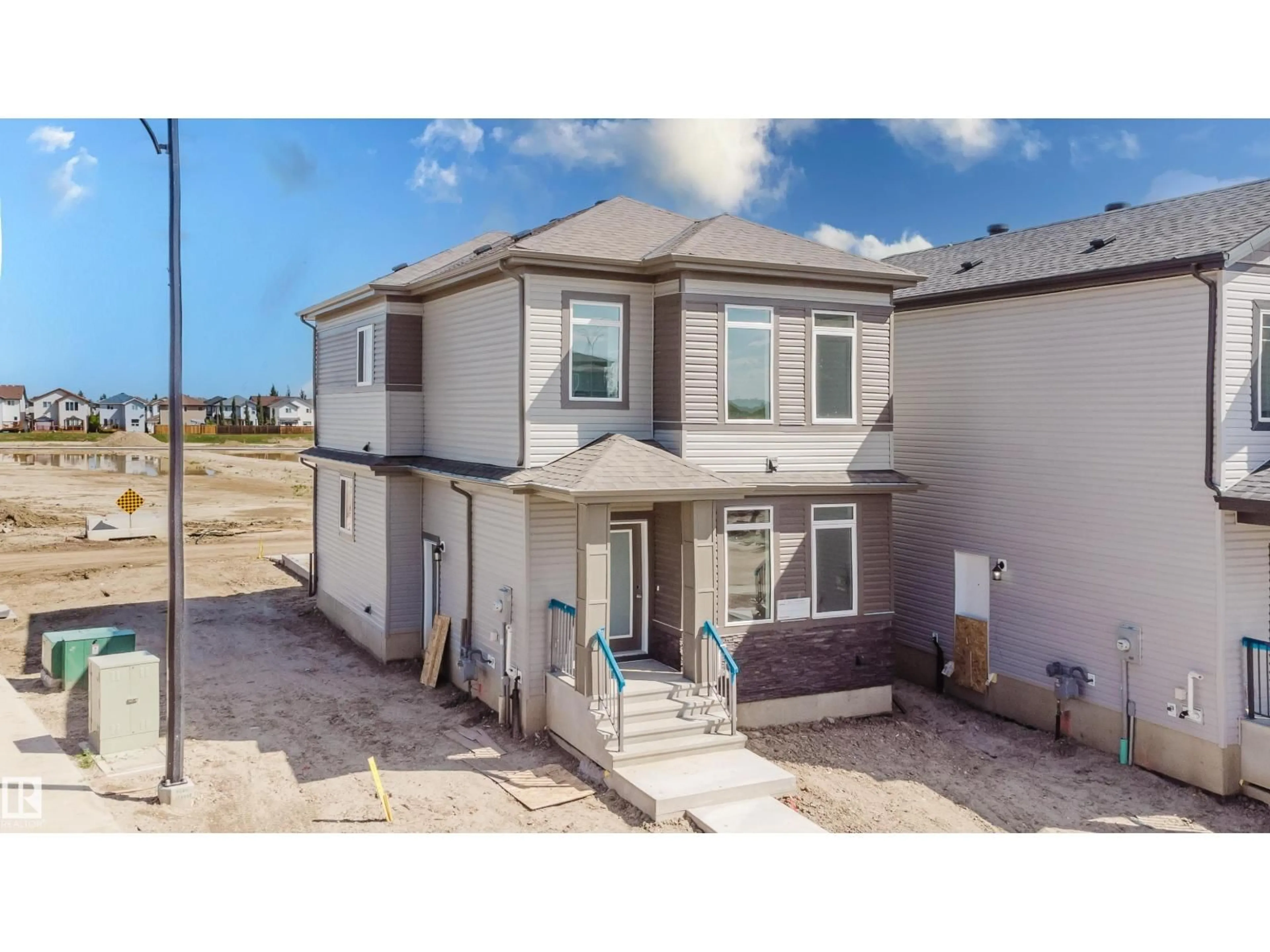 A pic from outside/outdoor area/front of a property/back of a property/a pic from drone, street for 261 MUNN WY, Leduc Alberta T9E0S9