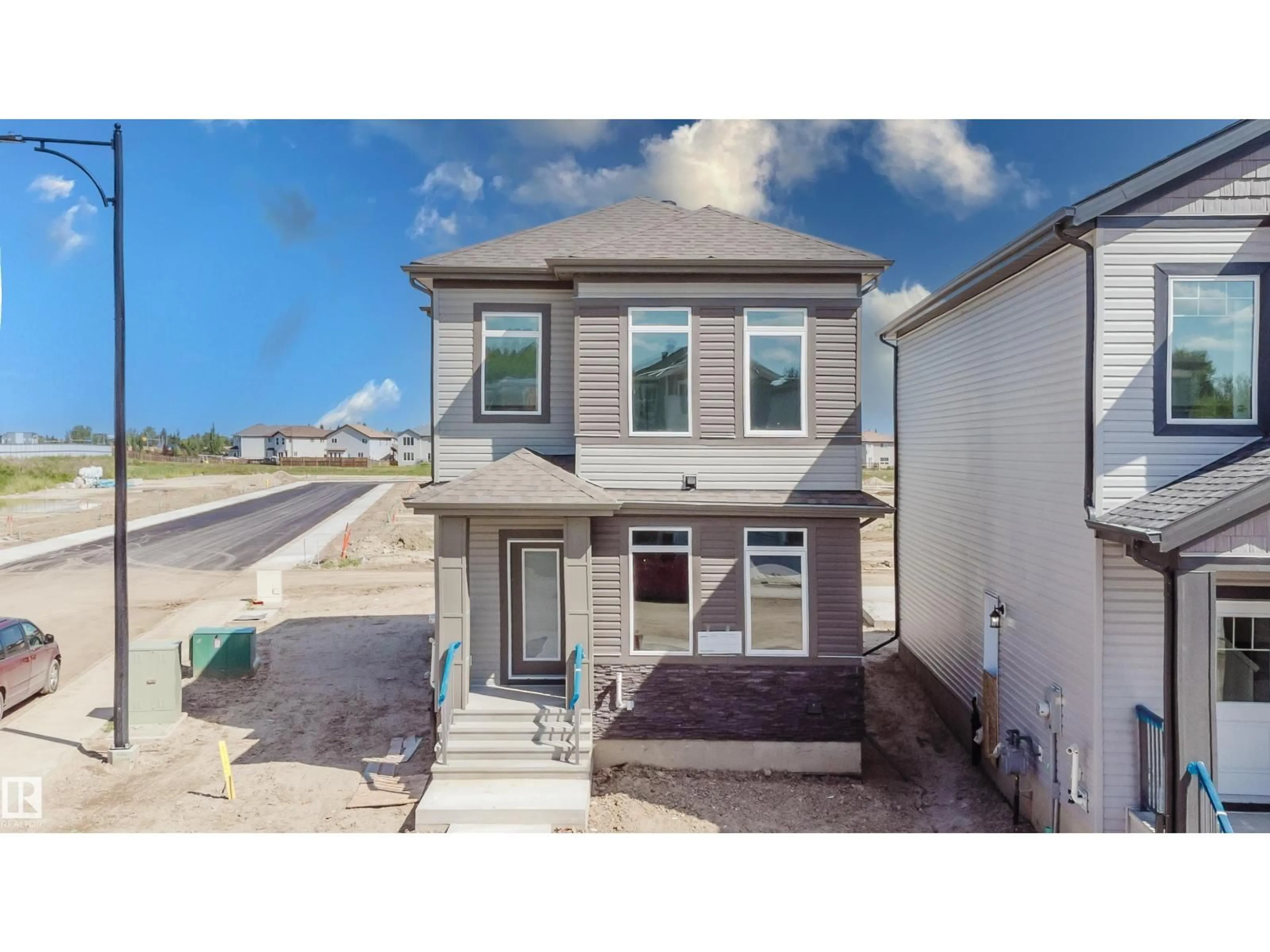 A pic from outside/outdoor area/front of a property/back of a property/a pic from drone, street for 261 MUNN WY, Leduc Alberta T9E0S9