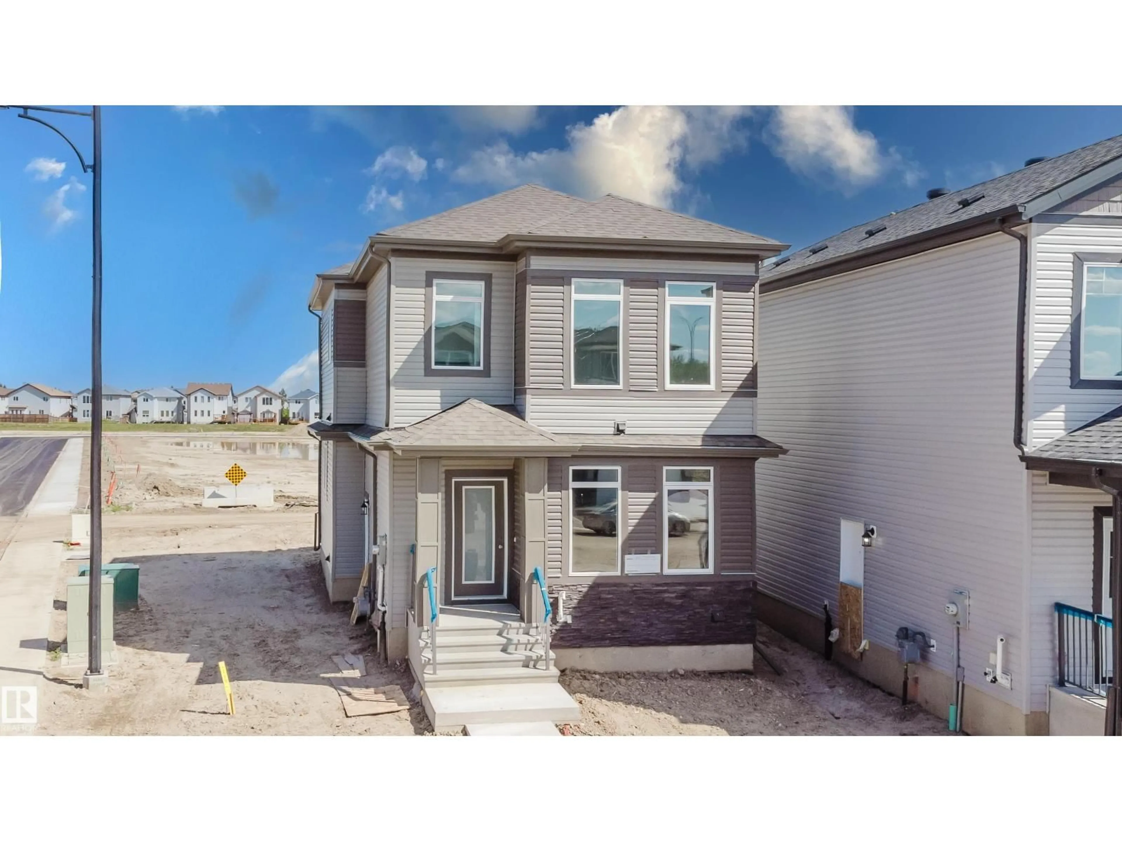 A pic from outside/outdoor area/front of a property/back of a property/a pic from drone, street for 261 MUNN WY, Leduc Alberta T9E0S9