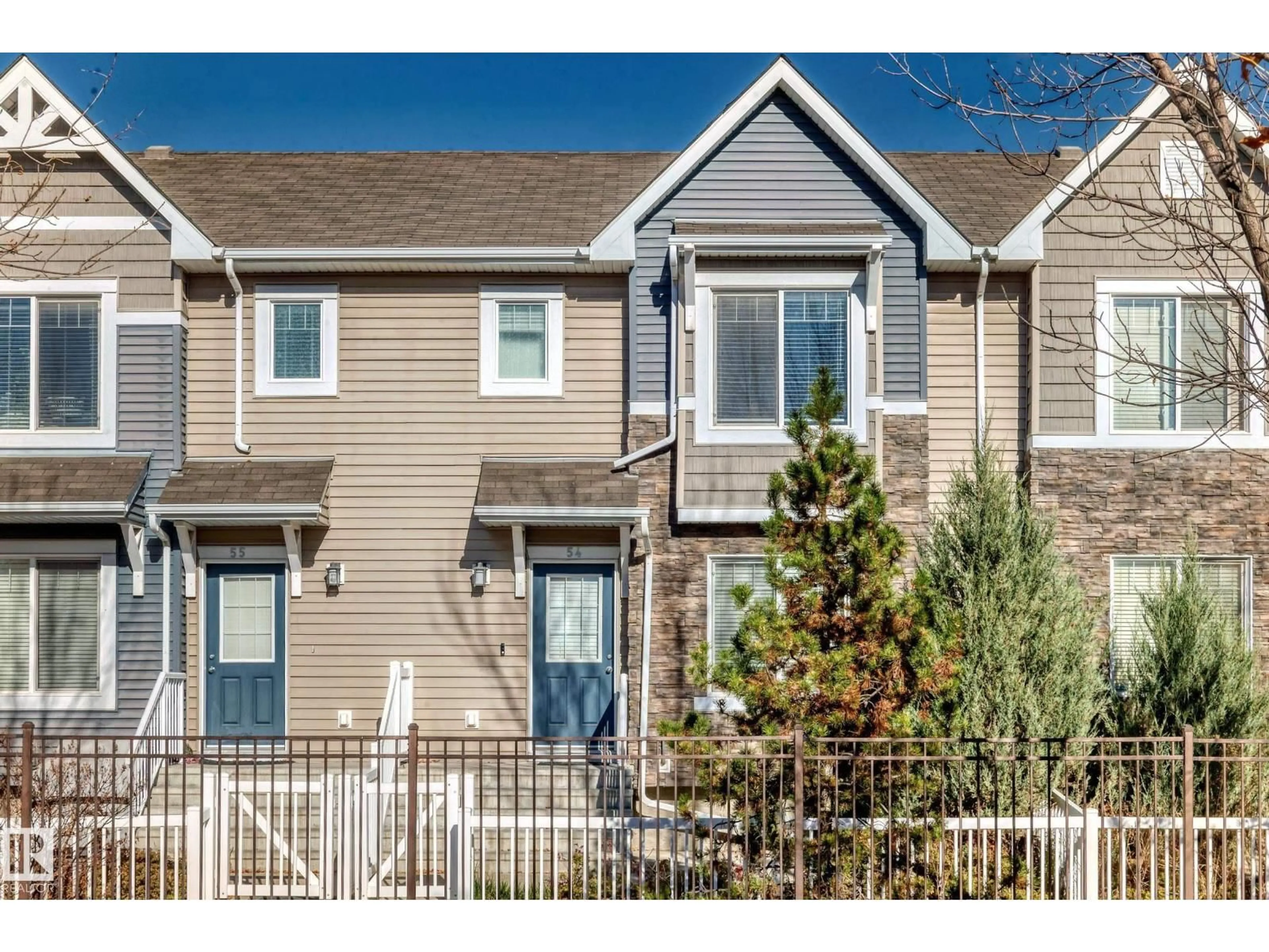 Home with vinyl exterior material, street for #54 - 3625 144 AV, Edmonton Alberta T5Y0T3
