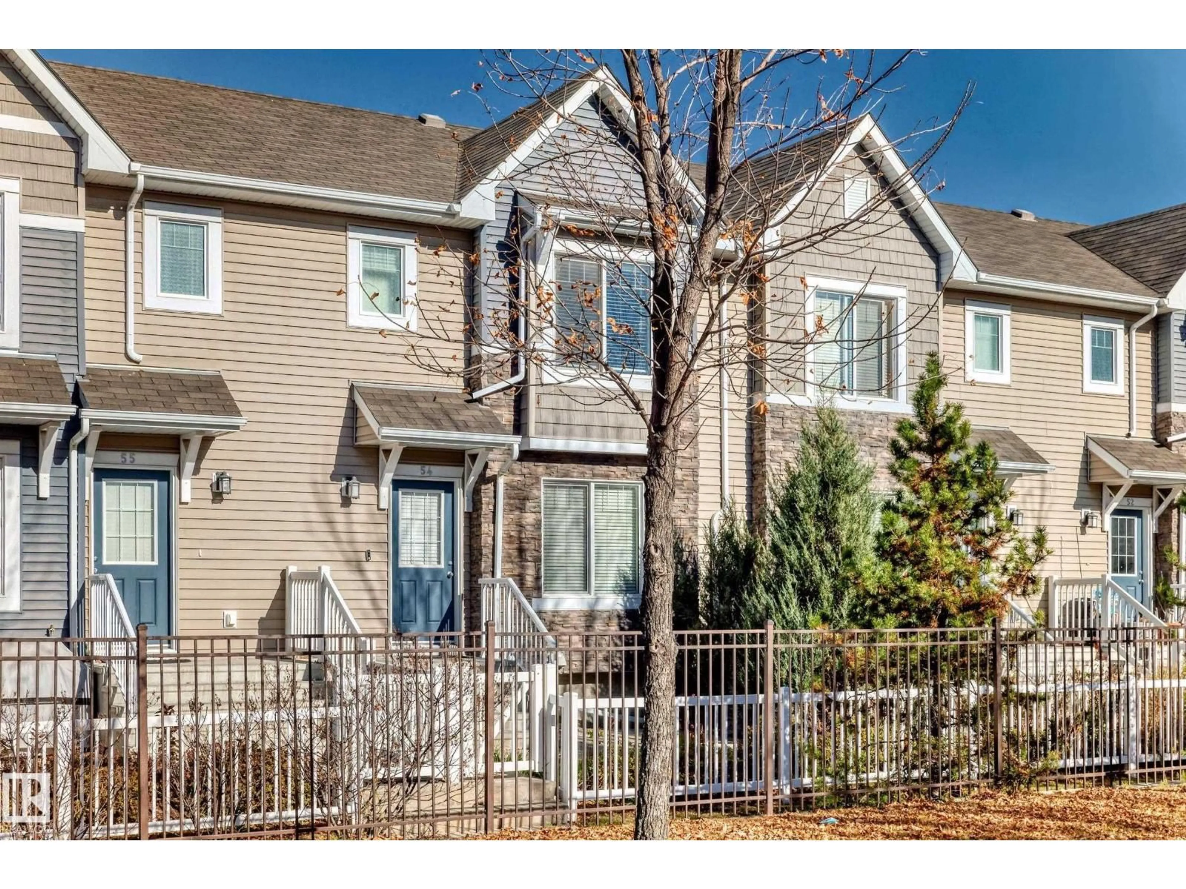 Home with vinyl exterior material, street for #54 - 3625 144 AV, Edmonton Alberta T5Y0T3