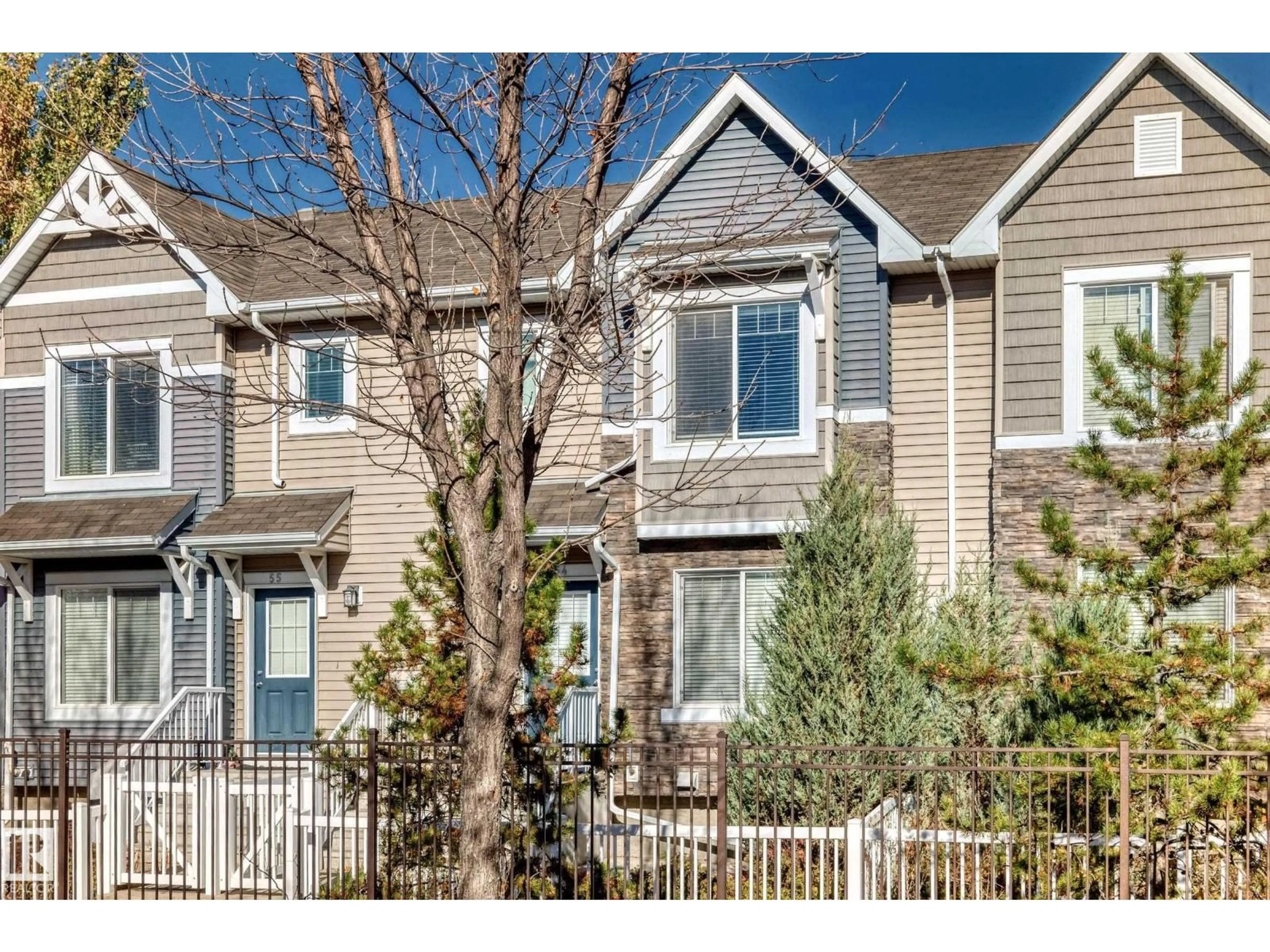 Home with vinyl exterior material, street for #54 - 3625 144 AV, Edmonton Alberta T5Y0T3