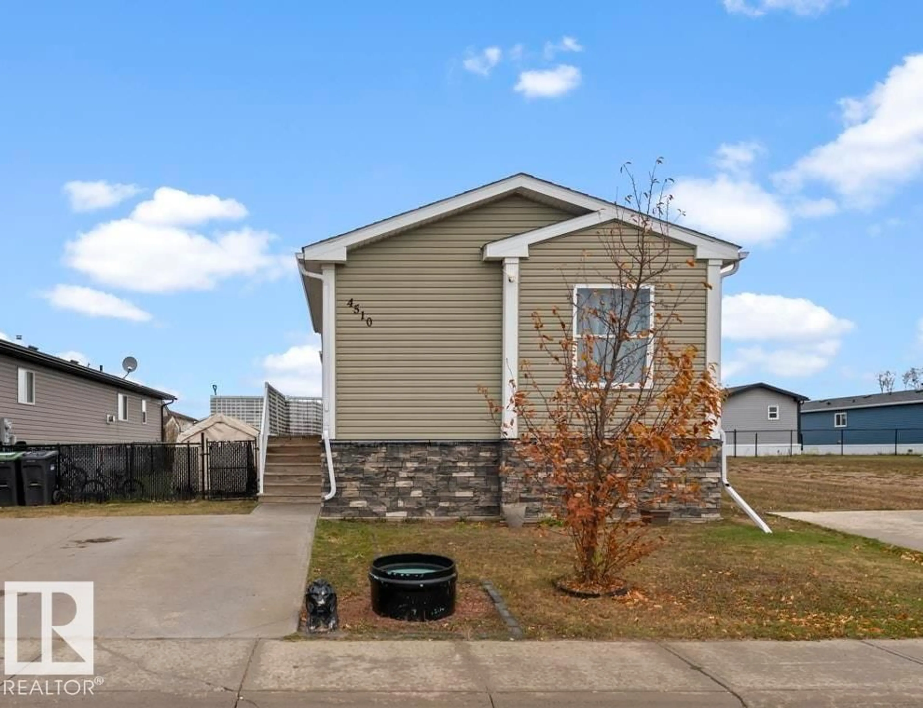 Home with vinyl exterior material, street for 4510 SNOWBIRD LN, Cold Lake Alberta T9M0C6