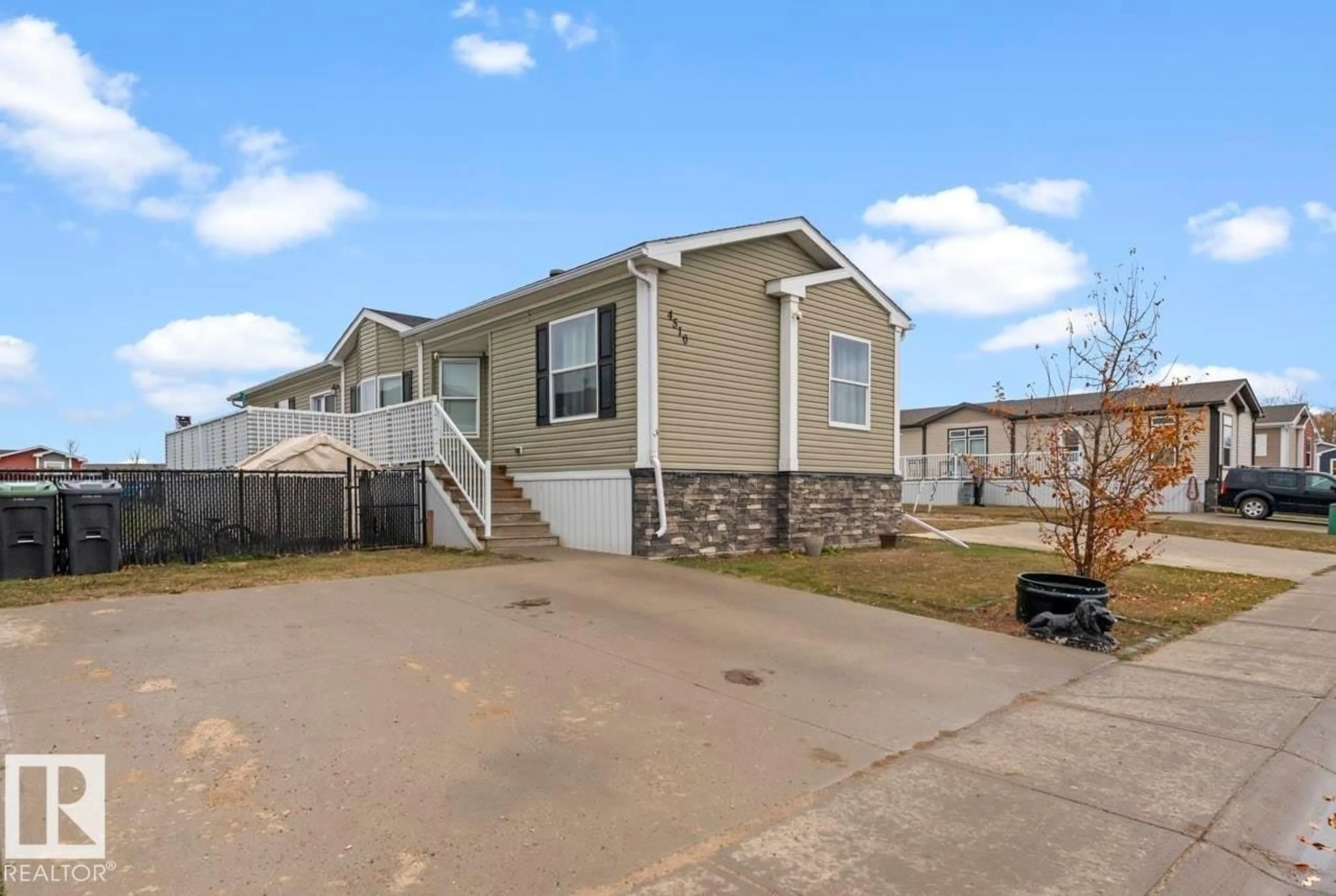 Home with vinyl exterior material, street for 4510 SNOWBIRD LN, Cold Lake Alberta T9M0C6