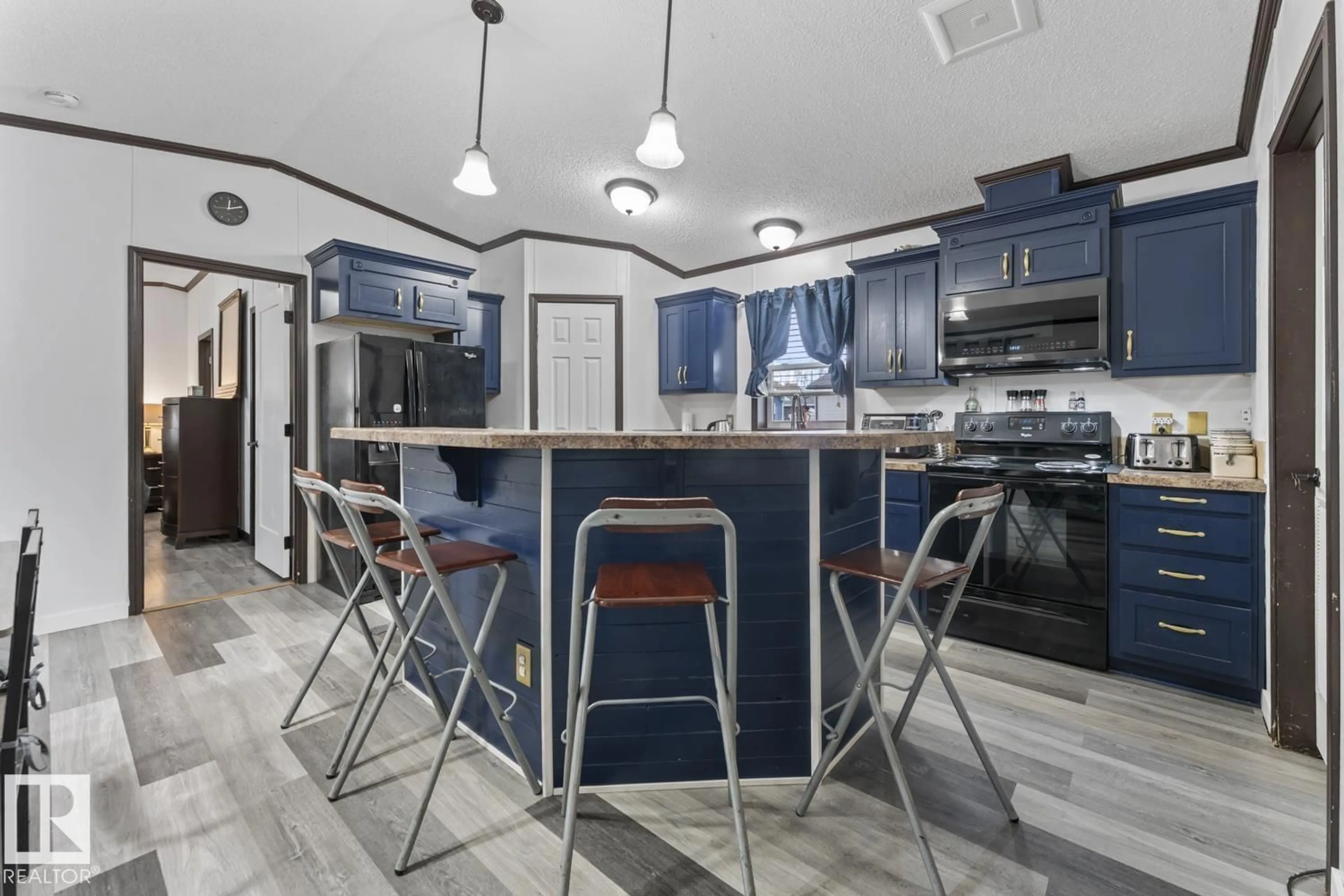 Open concept kitchen, ceramic/tile floor for 4510 SNOWBIRD LN, Cold Lake Alberta T9M0C6