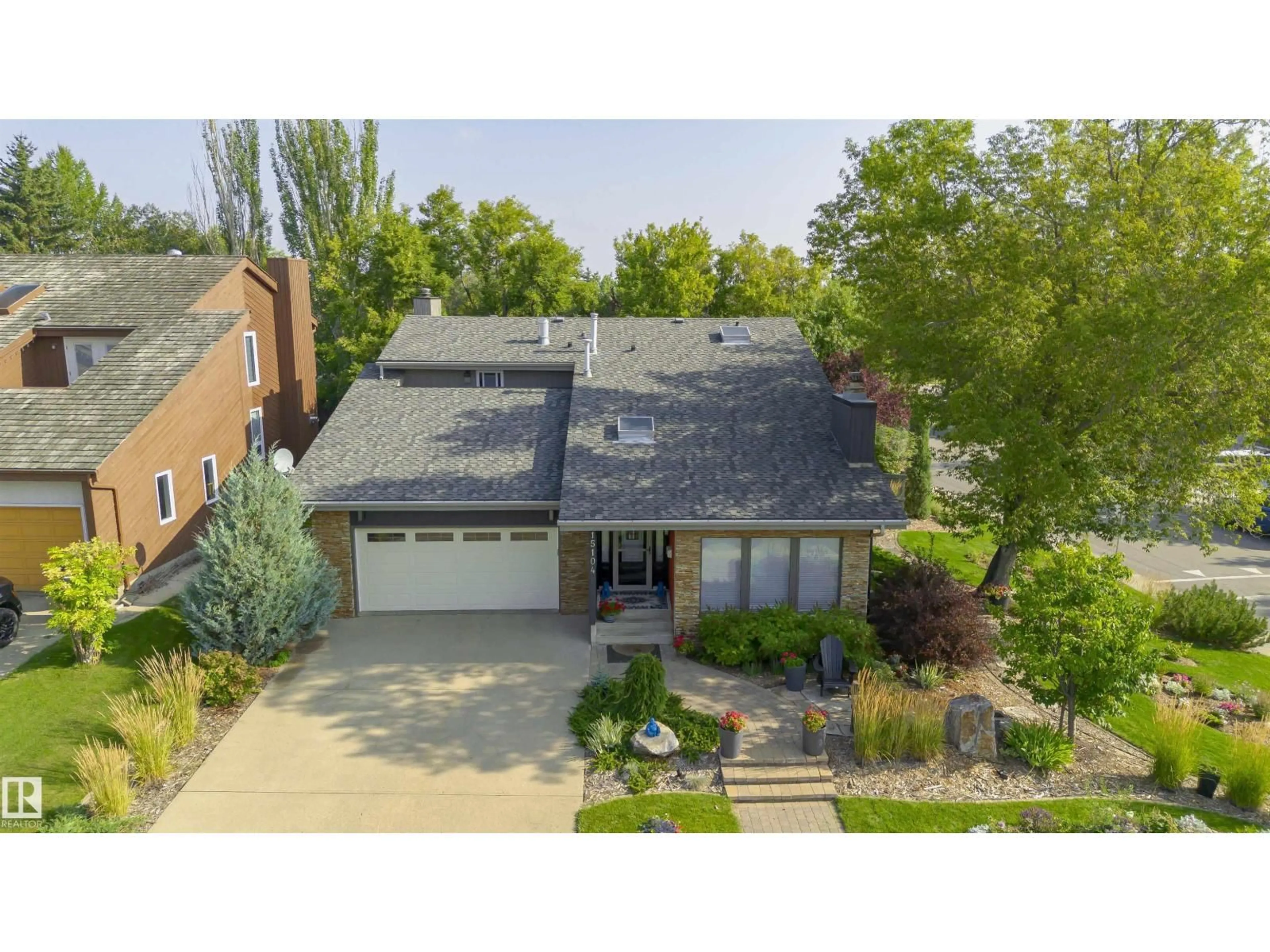 A pic from outside/outdoor area/front of a property/back of a property/a pic from drone, street for 15104 42 AV, Edmonton Alberta T6W1A5