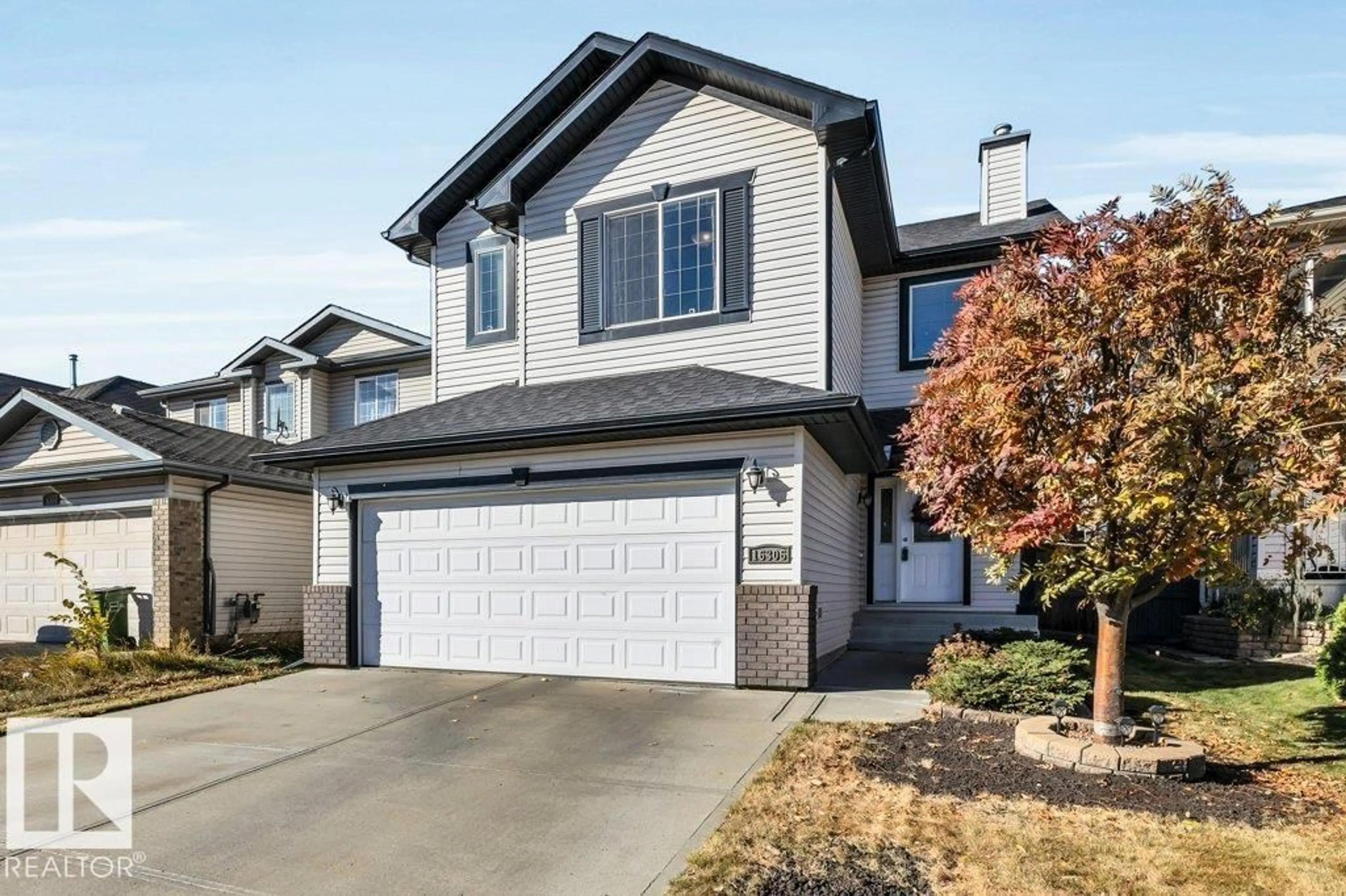 Home with vinyl exterior material, street for 16306 49 ST, Edmonton Alberta T5Y3H8