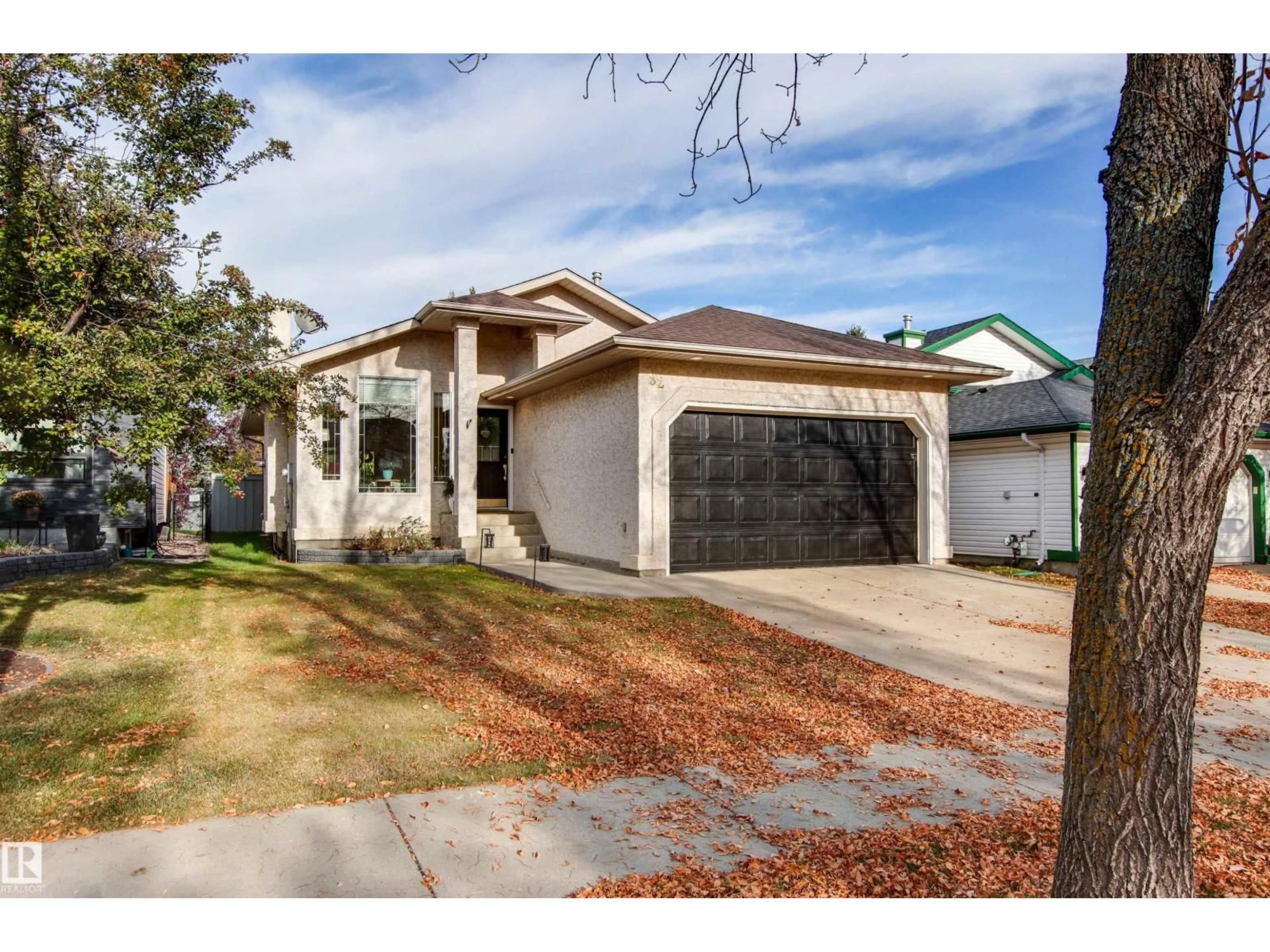 Home with vinyl exterior material, street for 82 OAKRIDGE DR, St. Albert Alberta T8N6L8