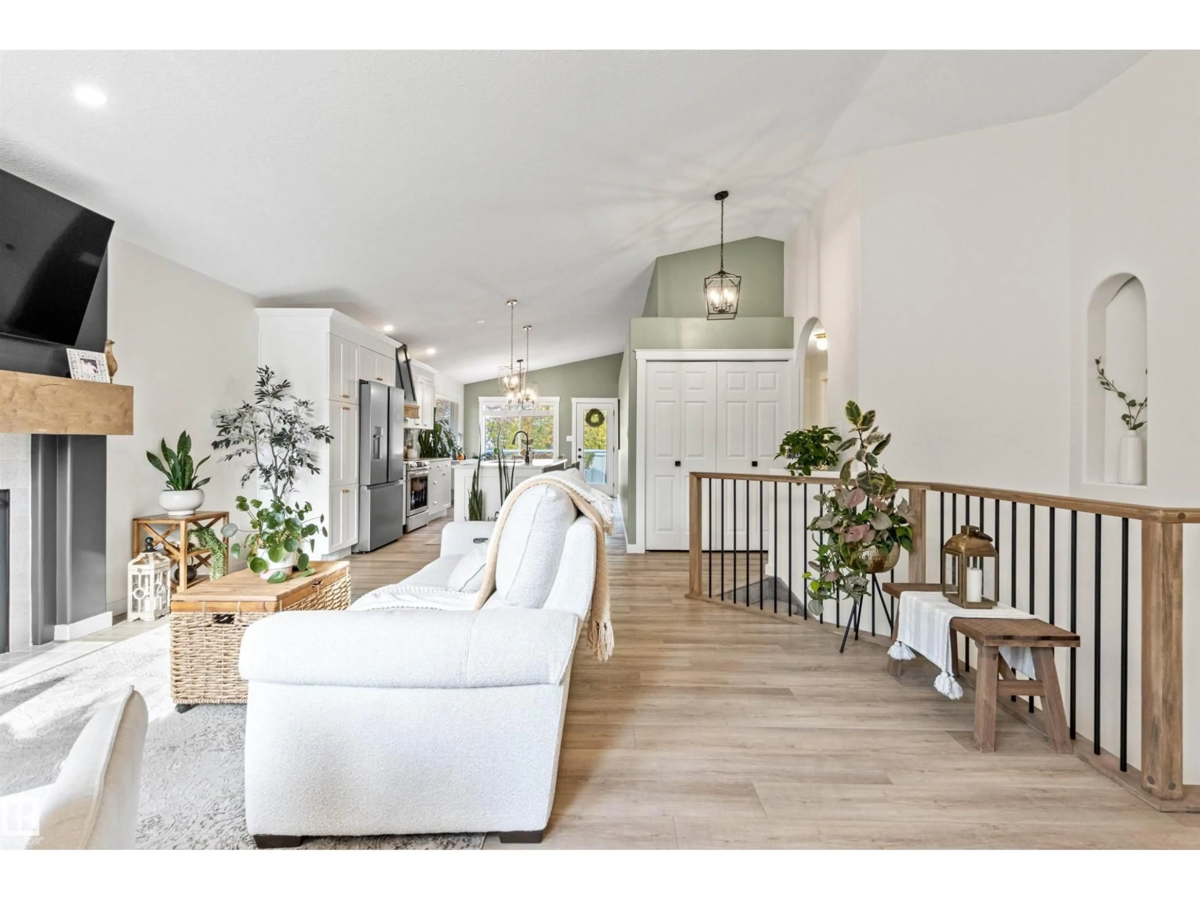 Living room with furniture, wood/laminate floor for 82 OAKRIDGE DR, St. Albert Alberta T8N6L8