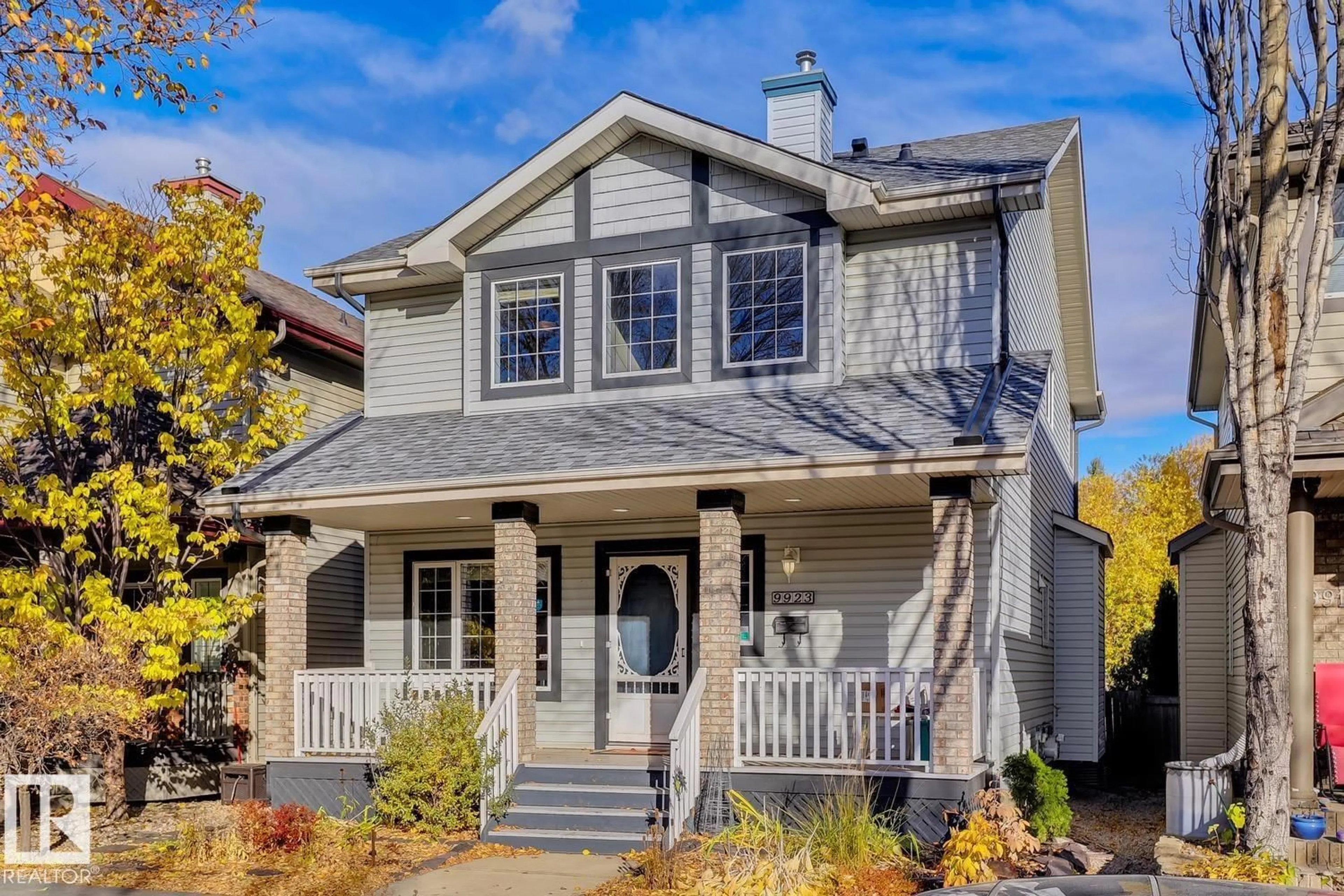 Home with vinyl exterior material, street for 9923 88 ST, Edmonton Alberta T5H4N1