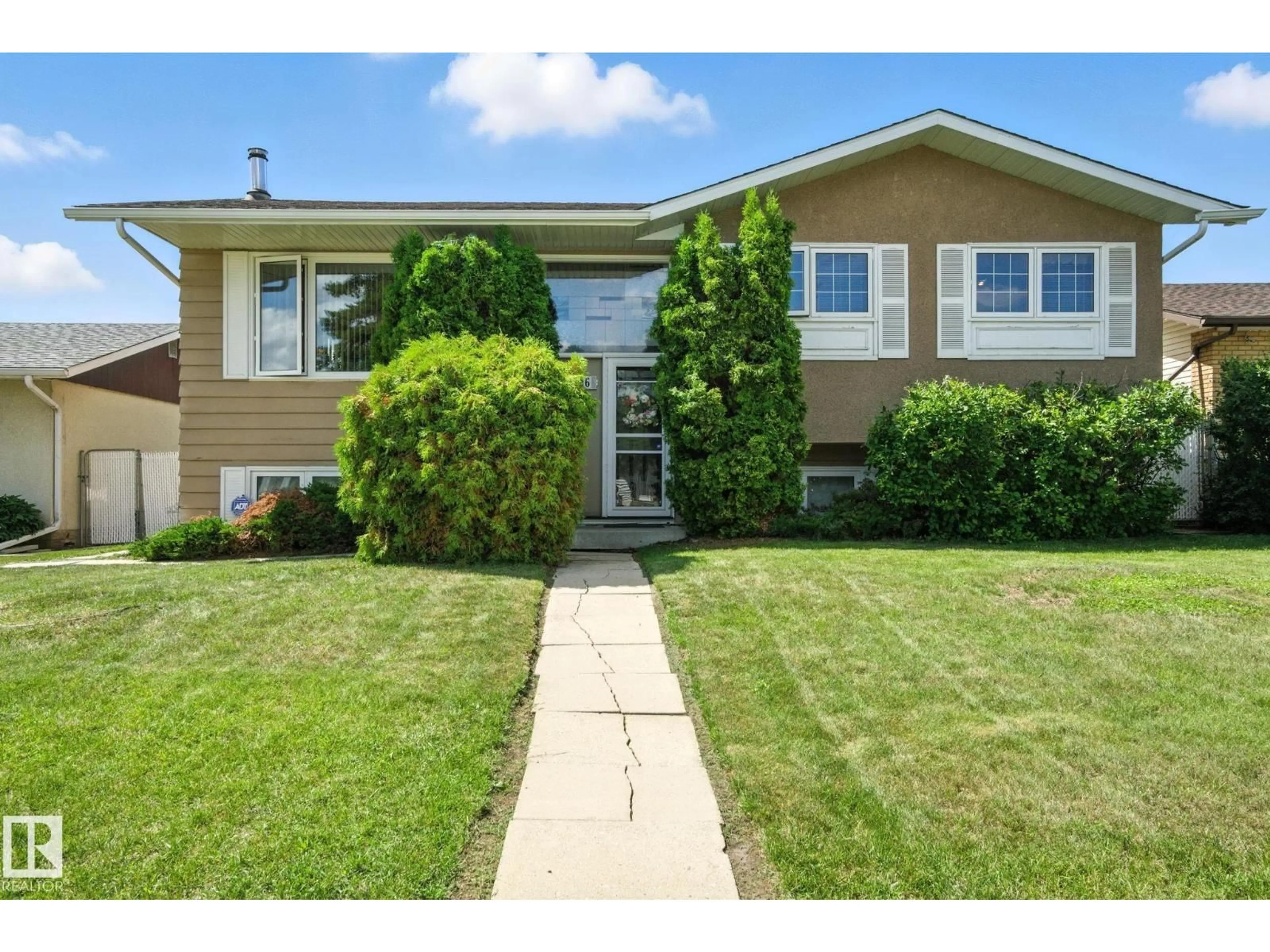 Home with vinyl exterior material, street for NW - 14936 81 ST, Edmonton Alberta T5C1P5