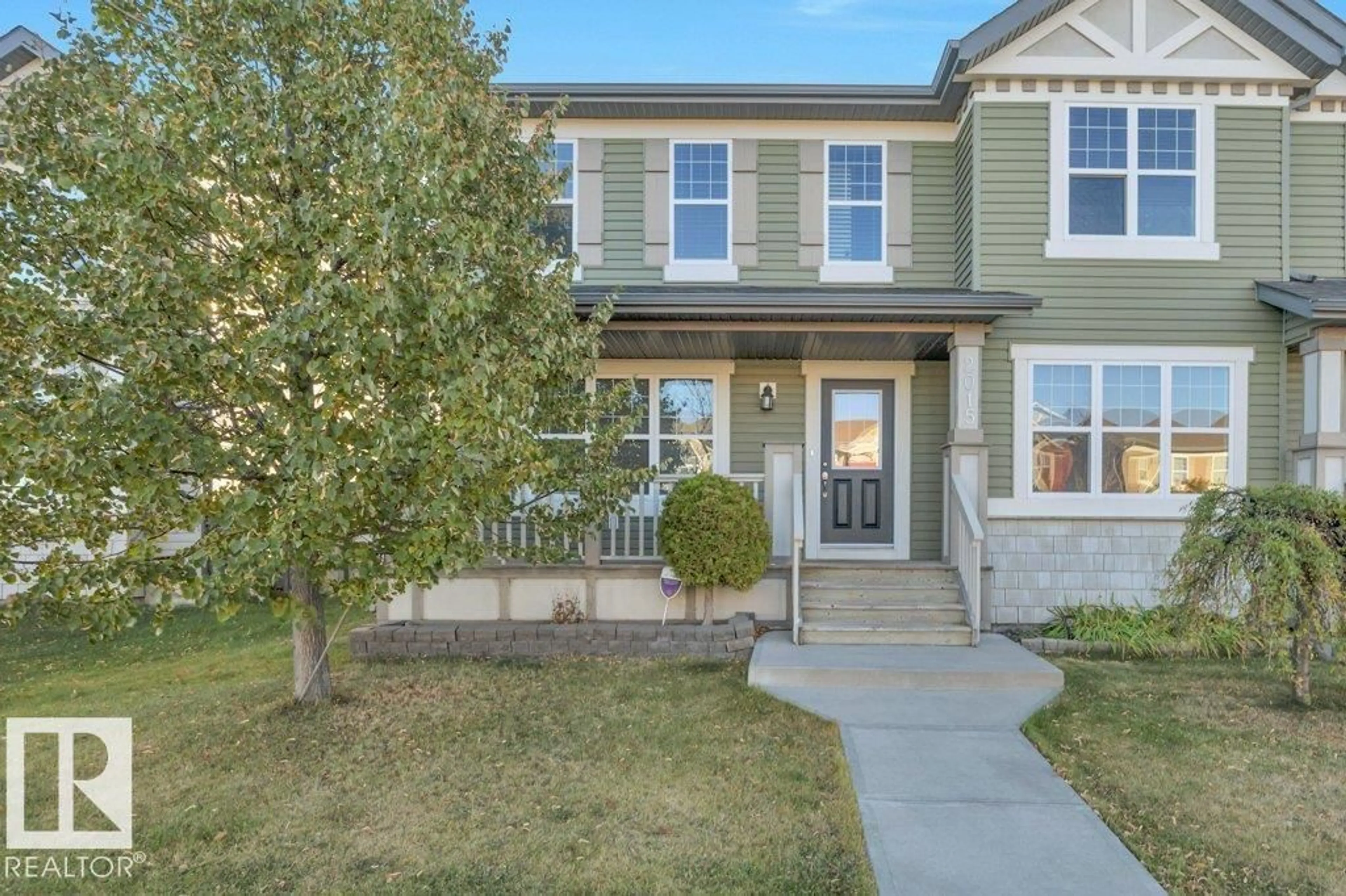Home with vinyl exterior material, street for 2015 32 ST, Edmonton Alberta T6T0K4