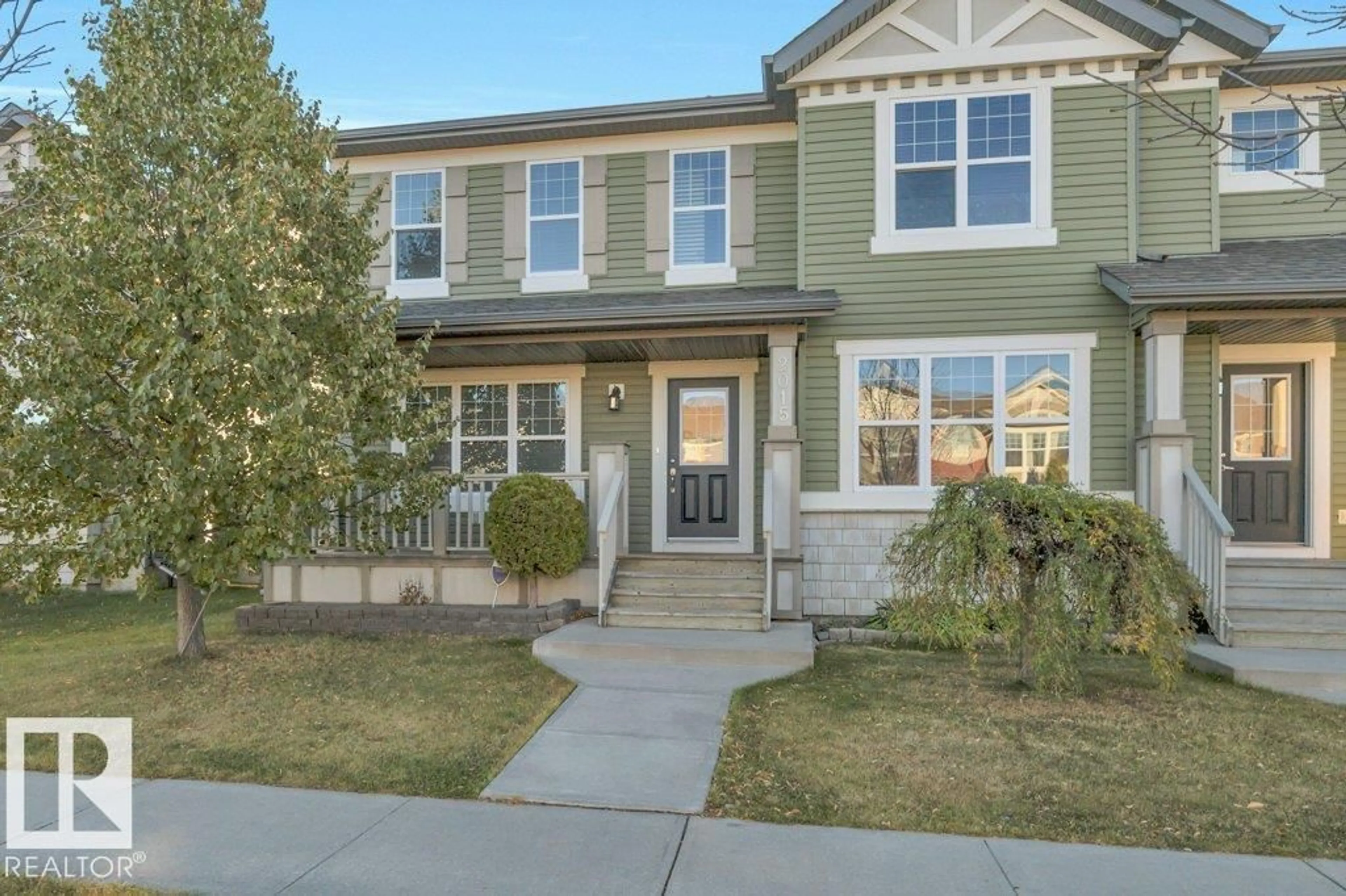 Home with vinyl exterior material, street for 2015 32 ST, Edmonton Alberta T6T0K4