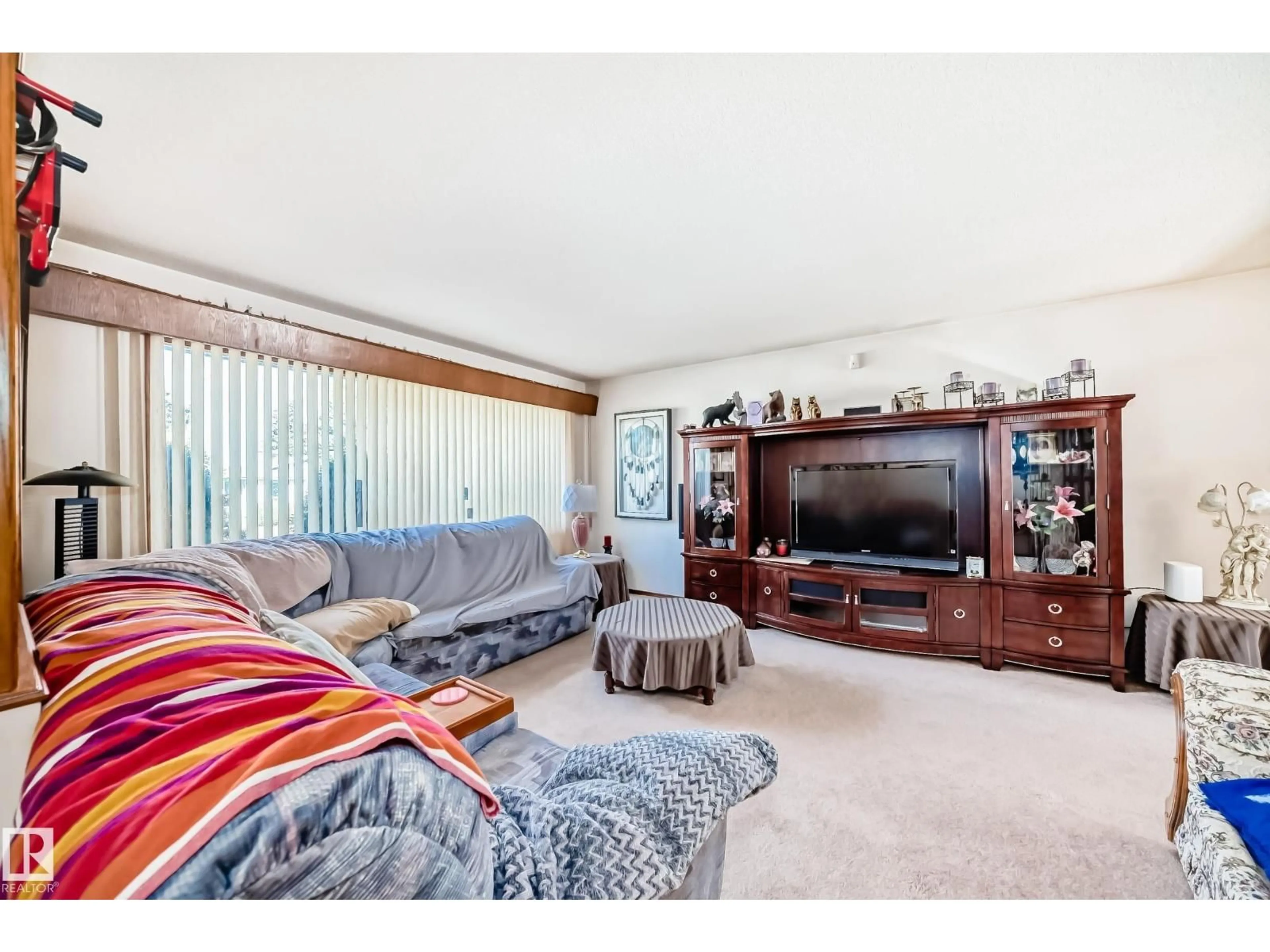 Living room with furniture, unknown for 7007 140 AV, Edmonton Alberta T5G2M6
