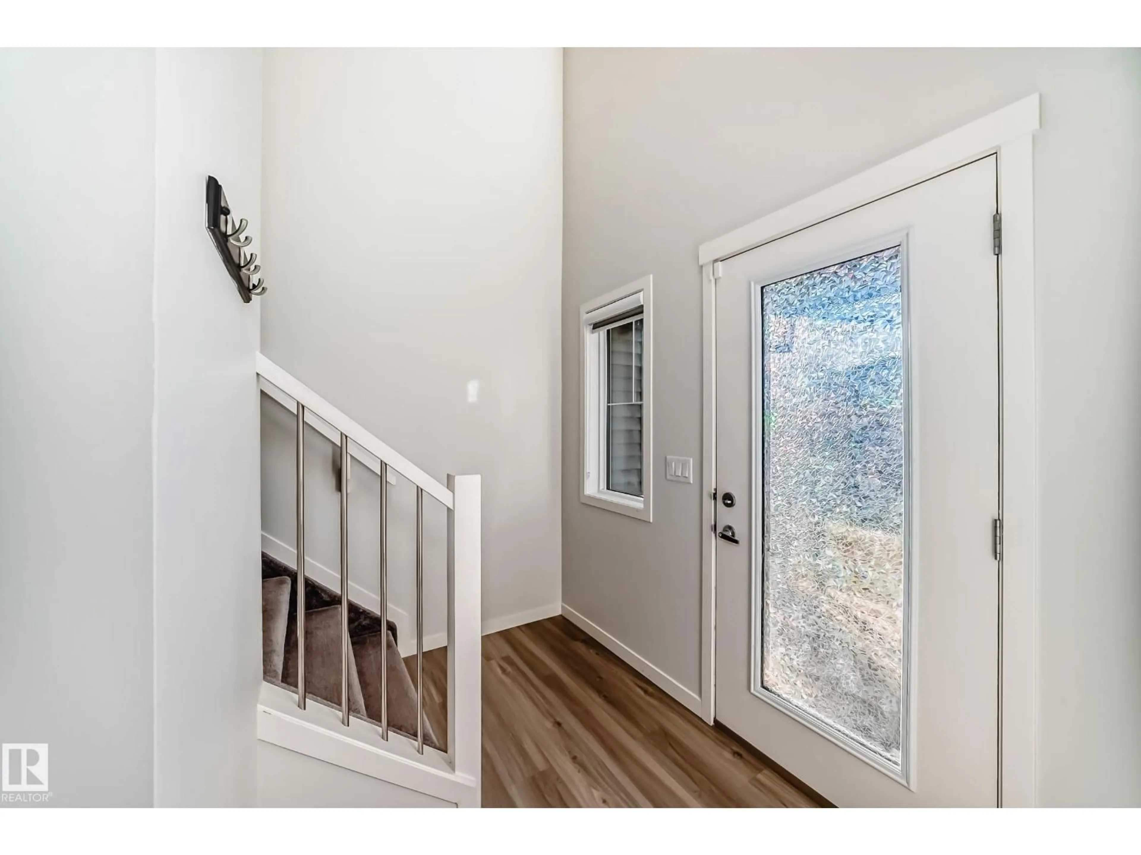 Indoor entryway for 19718 27 AV, Edmonton Alberta T6M0X1