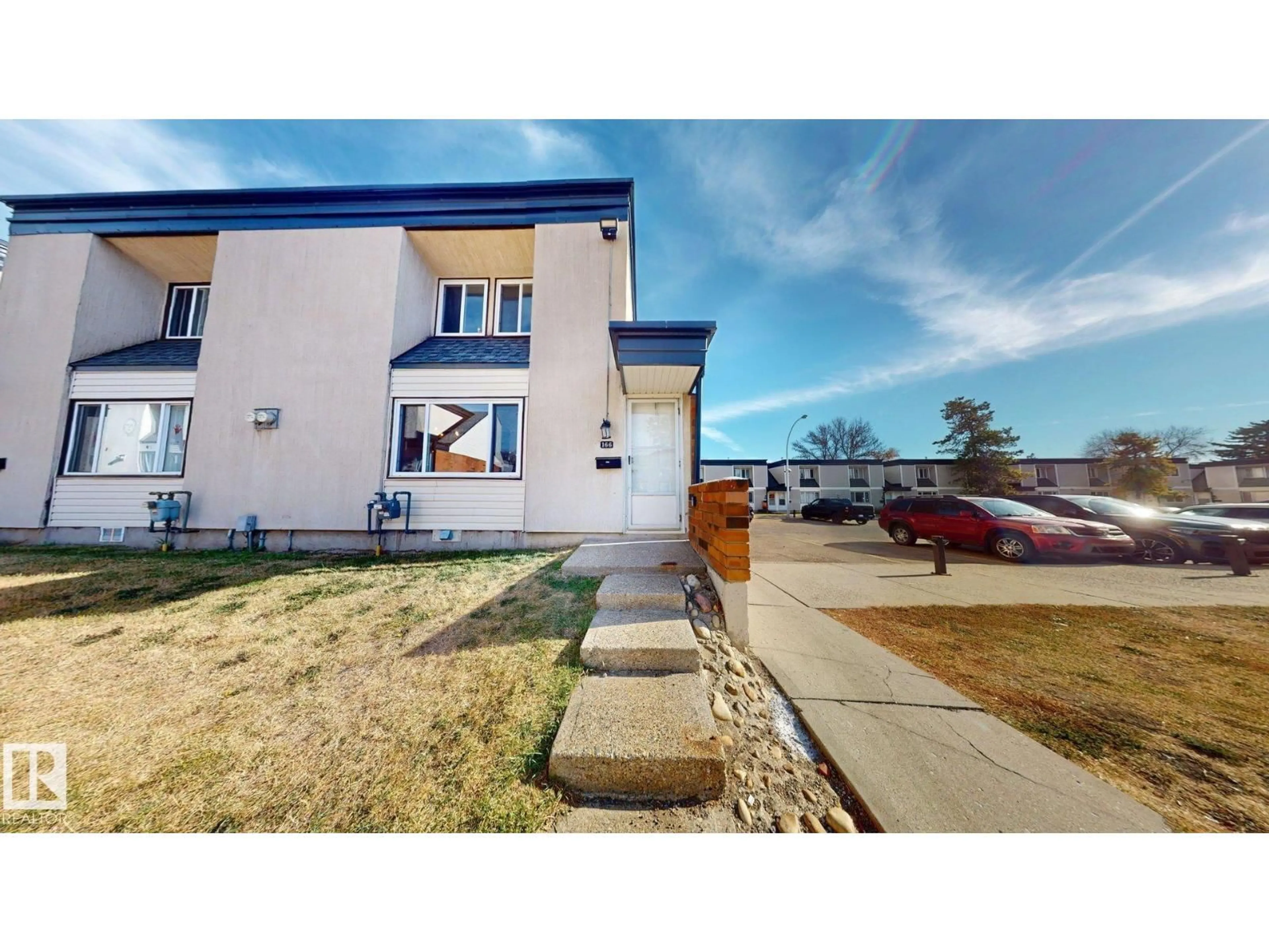 A pic from outside/outdoor area/front of a property/back of a property/a pic from drone, street for 3308 - 166 113 AV, Edmonton Alberta T5W5J8