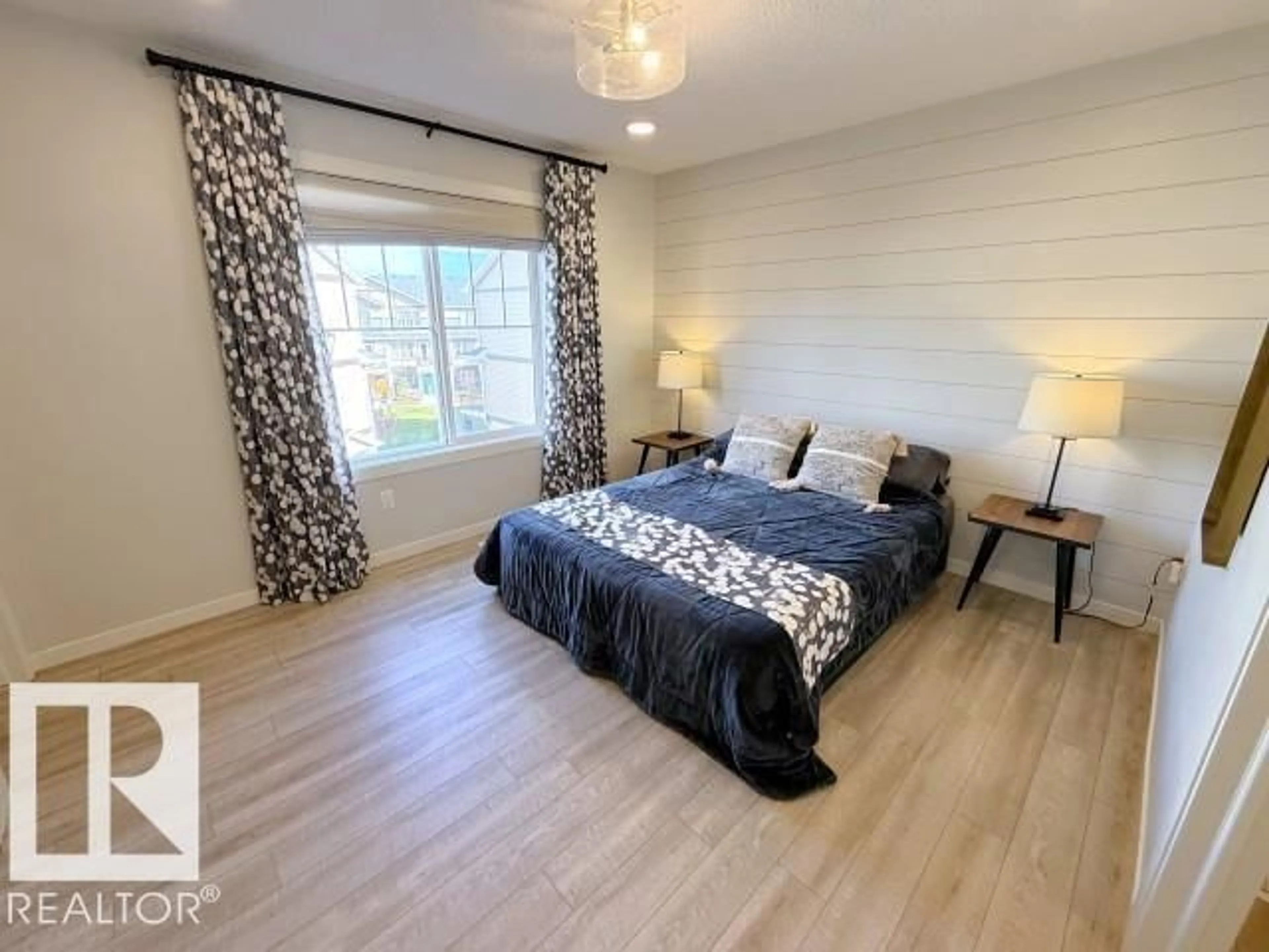 Bedroom with bed, wood/laminate floor for 50 - 67 MCLAUGHLIN DR, Spruce Grove Alberta T7X0E1
