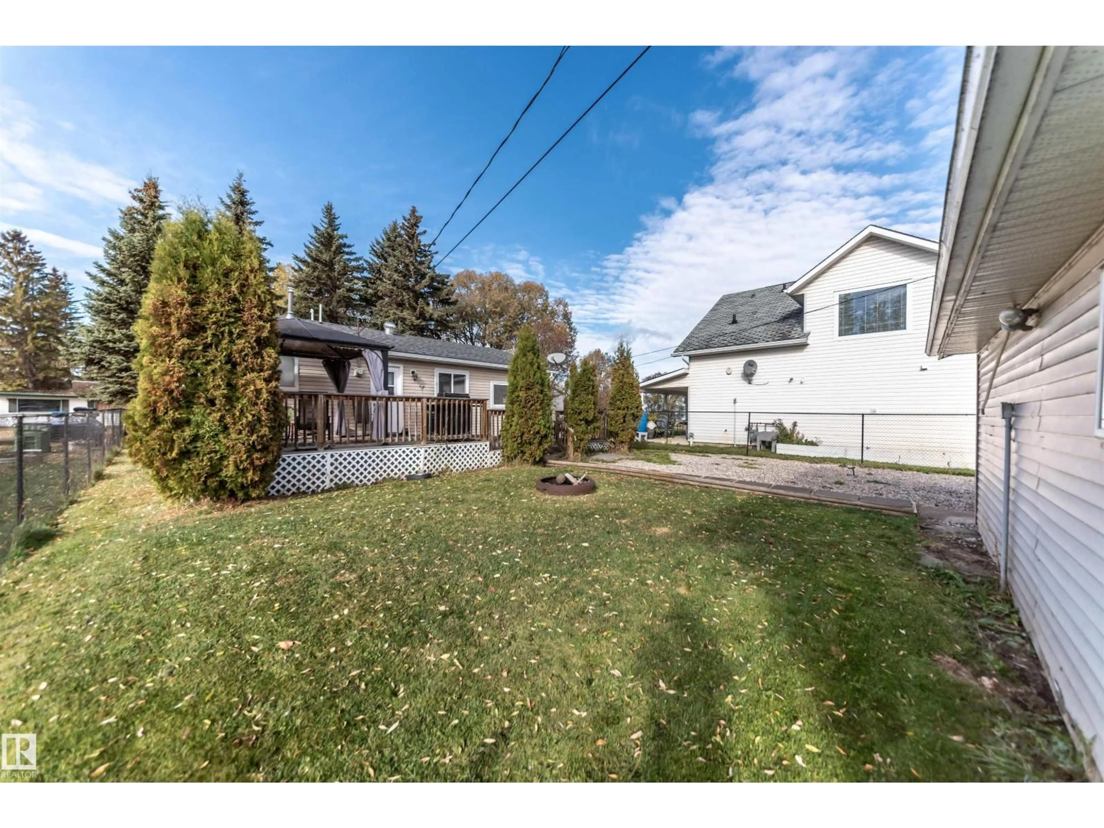 A pic from outside/outdoor area/front of a property/back of a property/a pic from drone, street for 5021 LAKEVIEW, Rural Lac Ste. Anne County Alberta T0E0A0