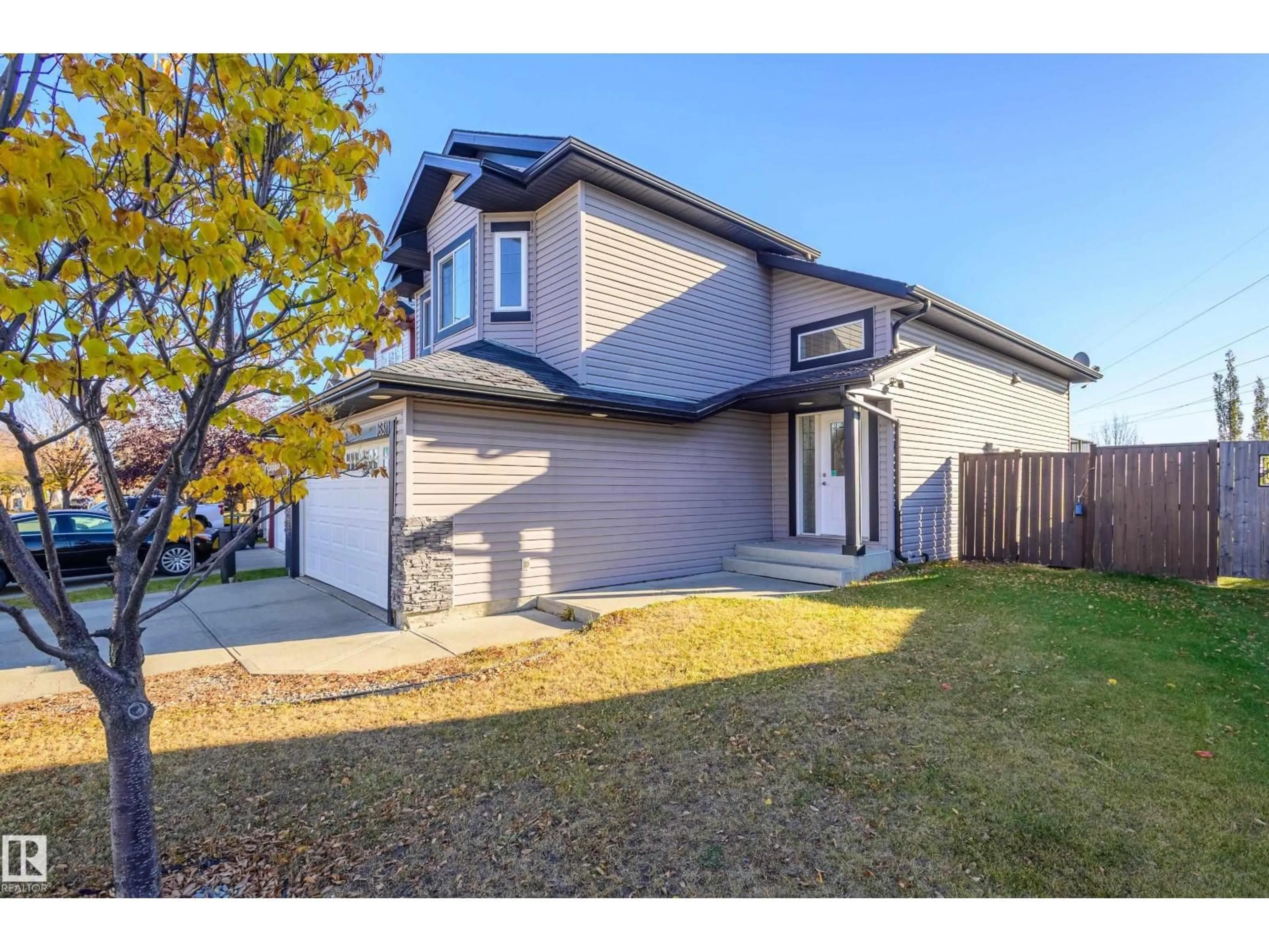 A pic from outside/outdoor area/front of a property/back of a property/a pic from drone, street for 16311 55 ST, Edmonton Alberta T5Y3K9
