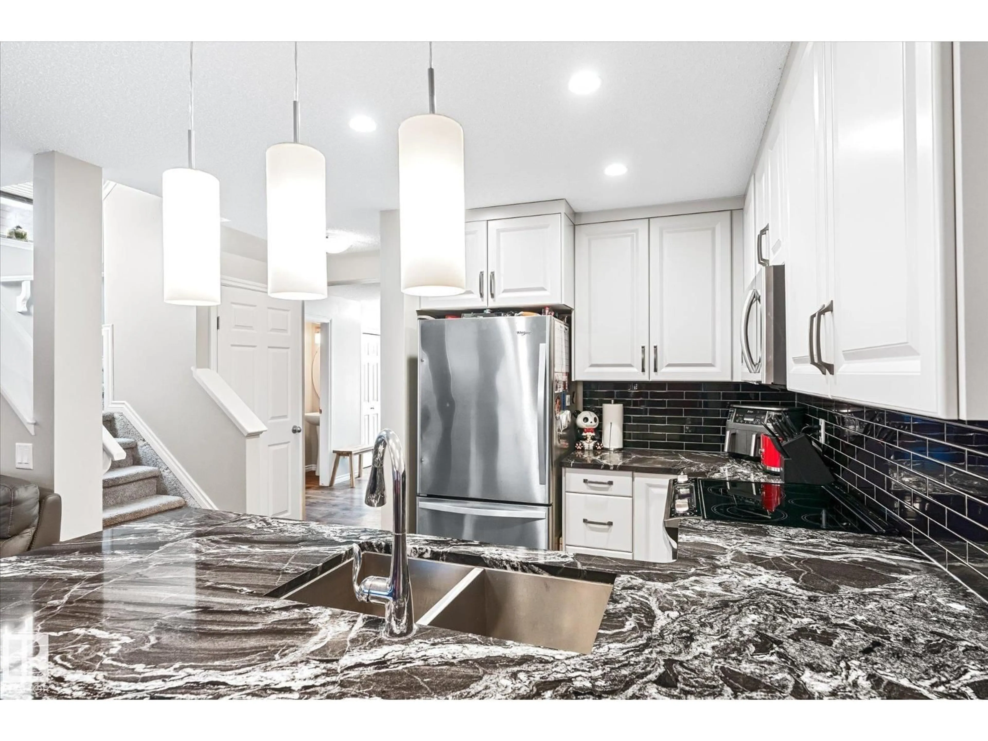 Contemporary kitchen, ceramic/tile floor for 2424 19A AV, Edmonton Alberta T6T2C9