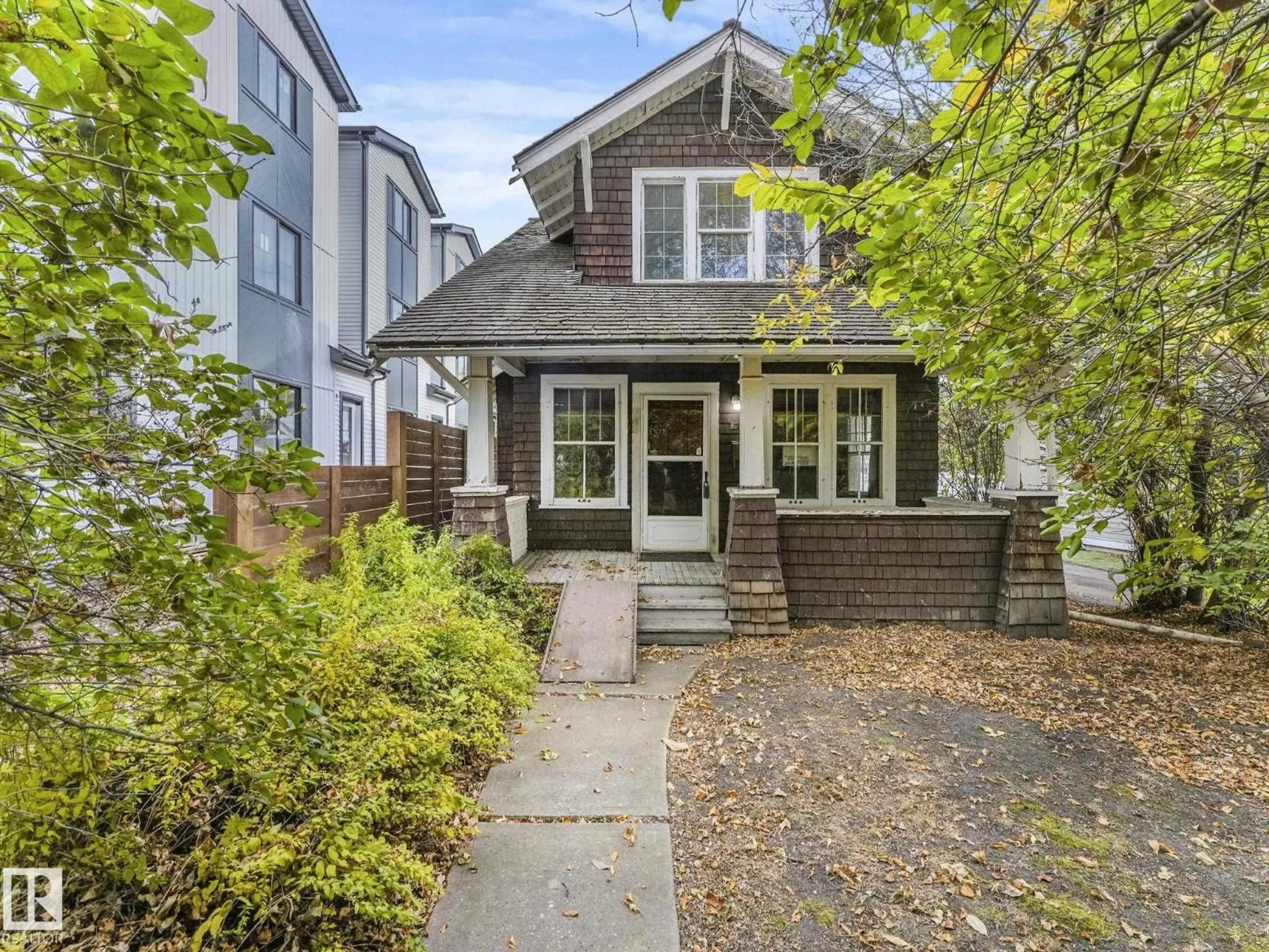 Home with brick exterior material, street for NW - 11119 62 ST, Edmonton Alberta T5W4B8