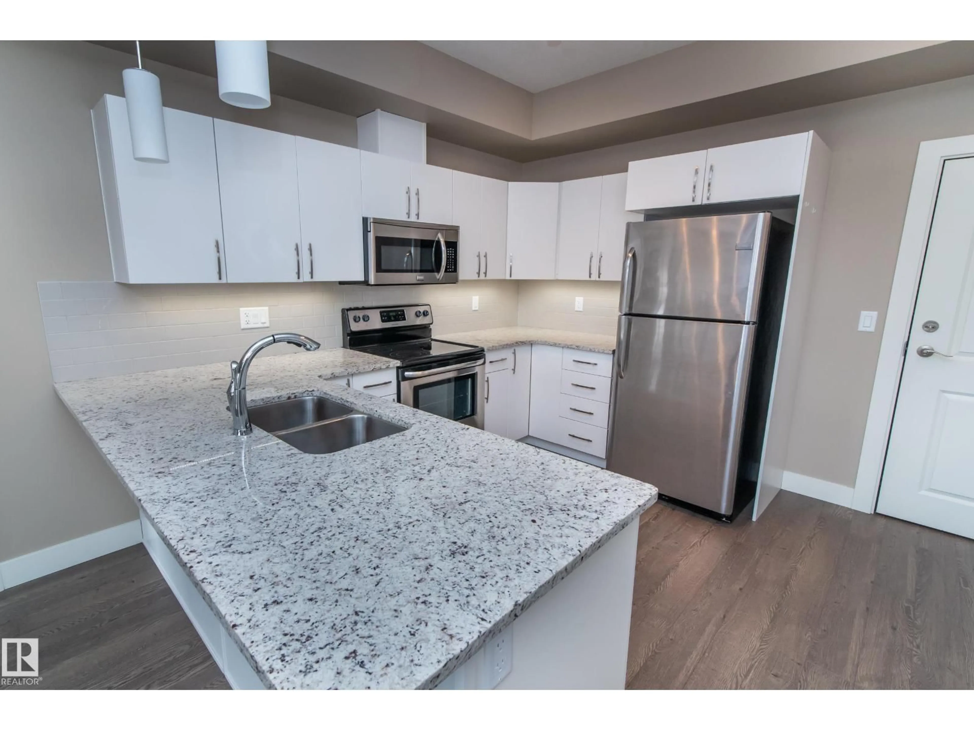 Open concept kitchen, unknown for 5001 - 114 ETON BOULEVARD, Sherwood Park Alberta T8H0N7