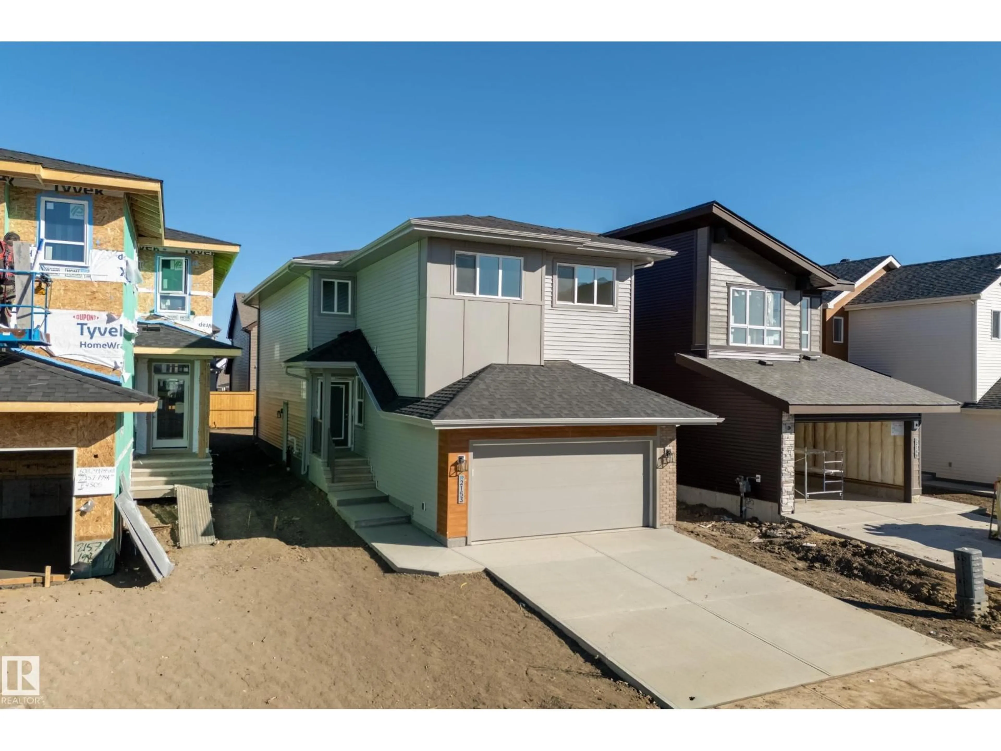 Home with vinyl exterior material, street for NW - 2153 194A ST, Edmonton Alberta T6M3J3