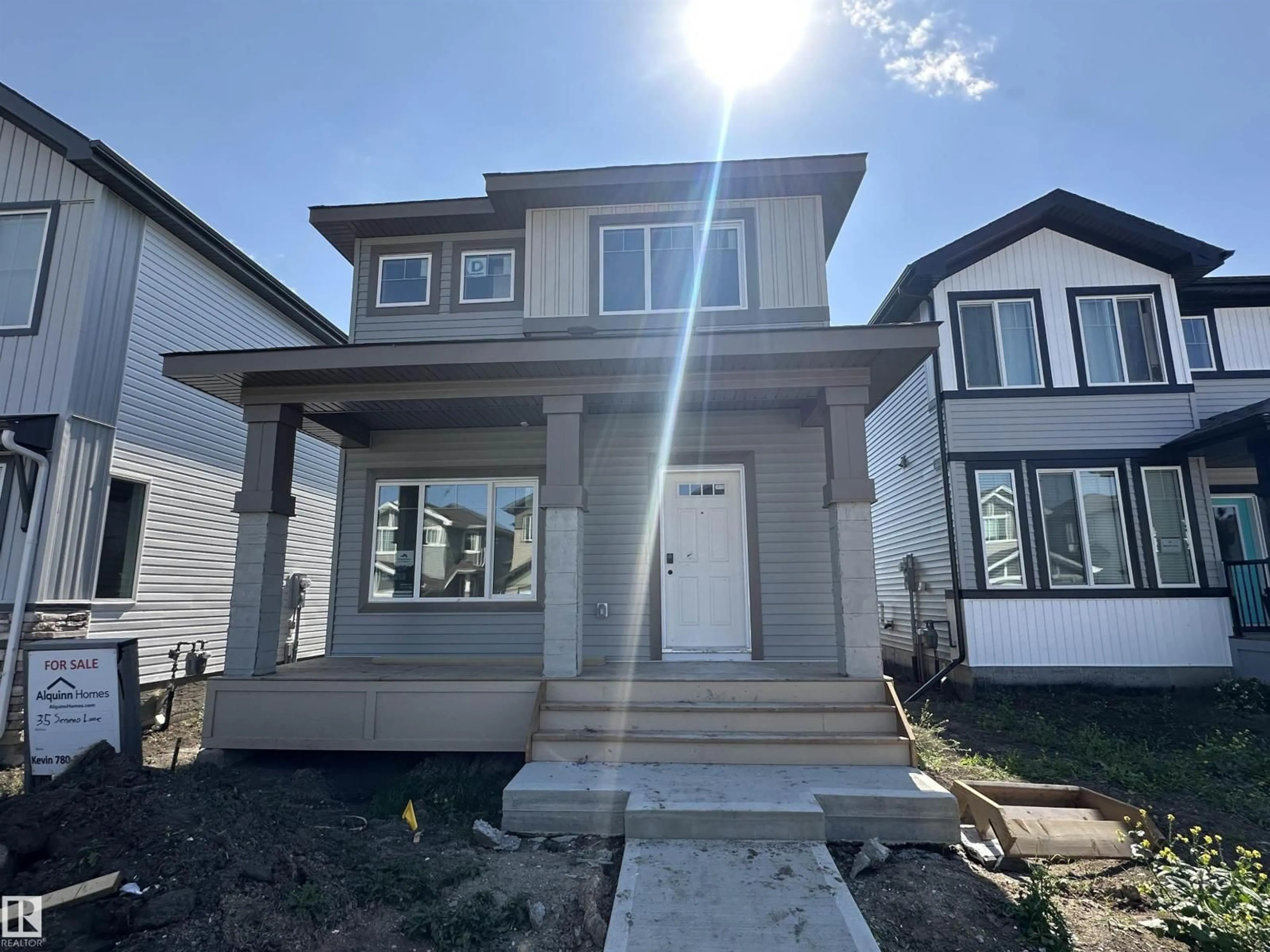 Home with vinyl exterior material, street for 35 SERENO LN, Fort Saskatchewan Alberta T8L0Z9