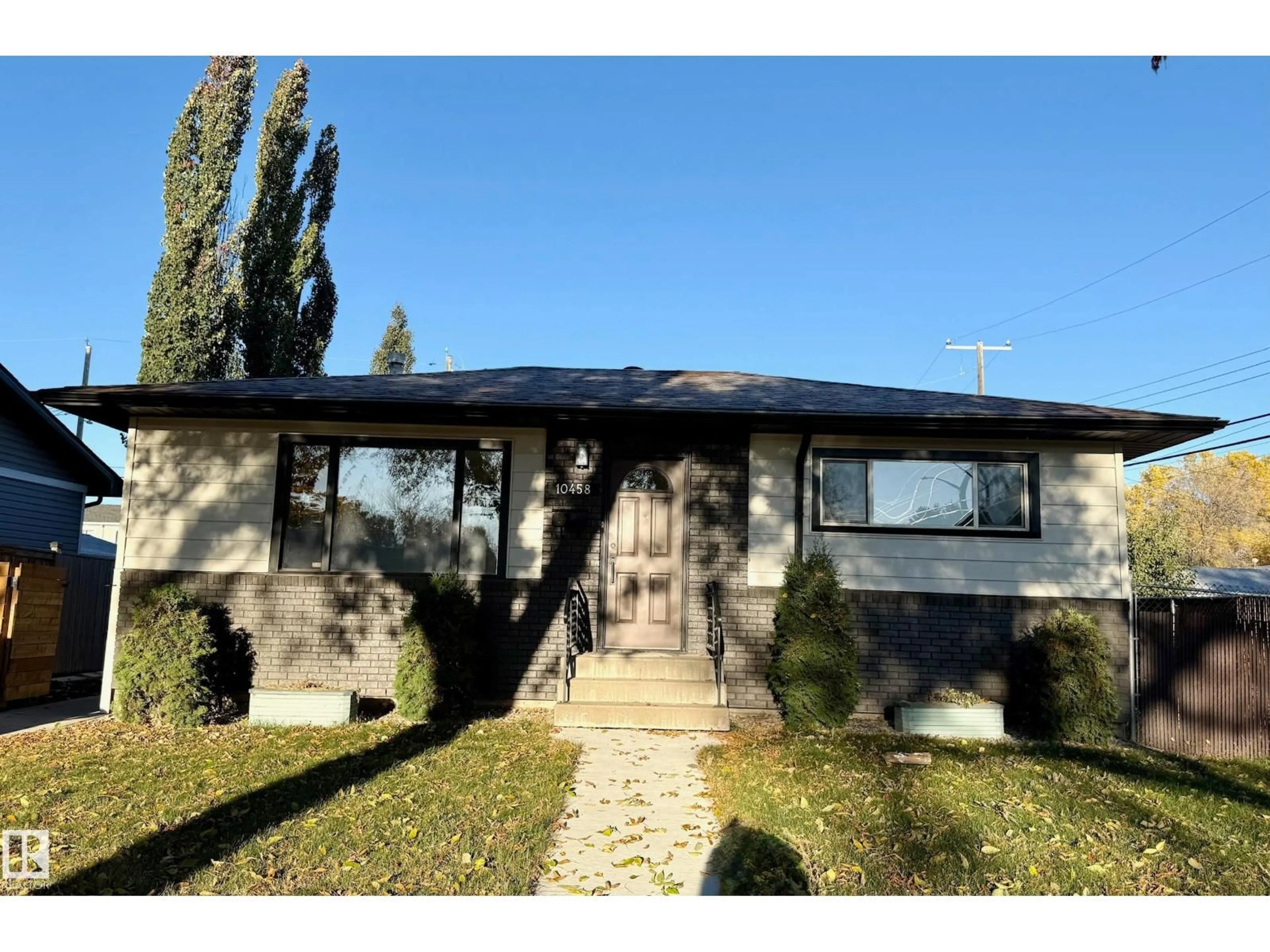 Home with vinyl exterior material, street for NW - 10458 166 ST, Edmonton Alberta T8A6C7