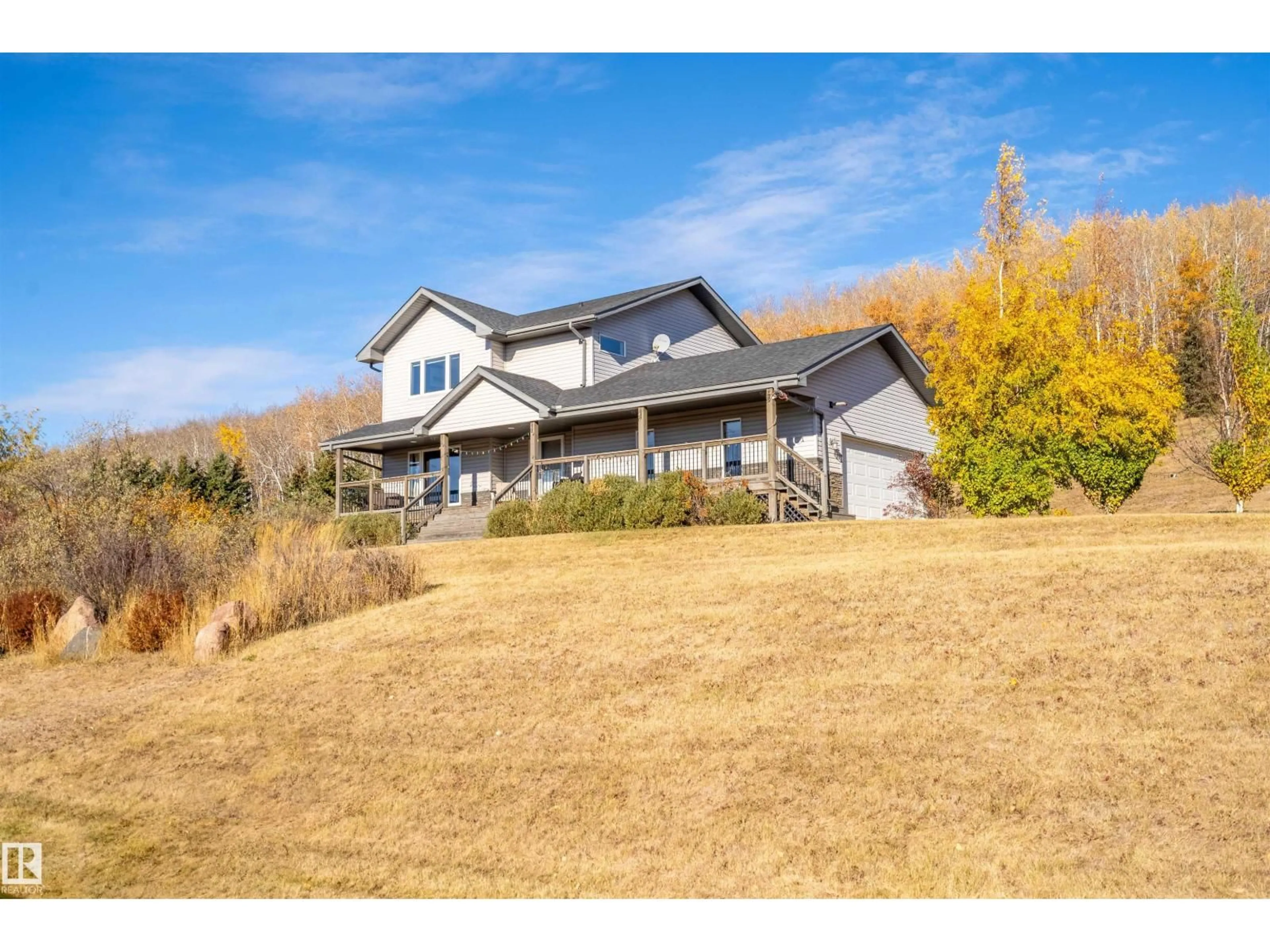 A pic from outside/outdoor area/front of a property/back of a property/a pic from drone, mountain view for 5003 52 AV, Rural Bonnyville M.D. Alberta T0A0T0