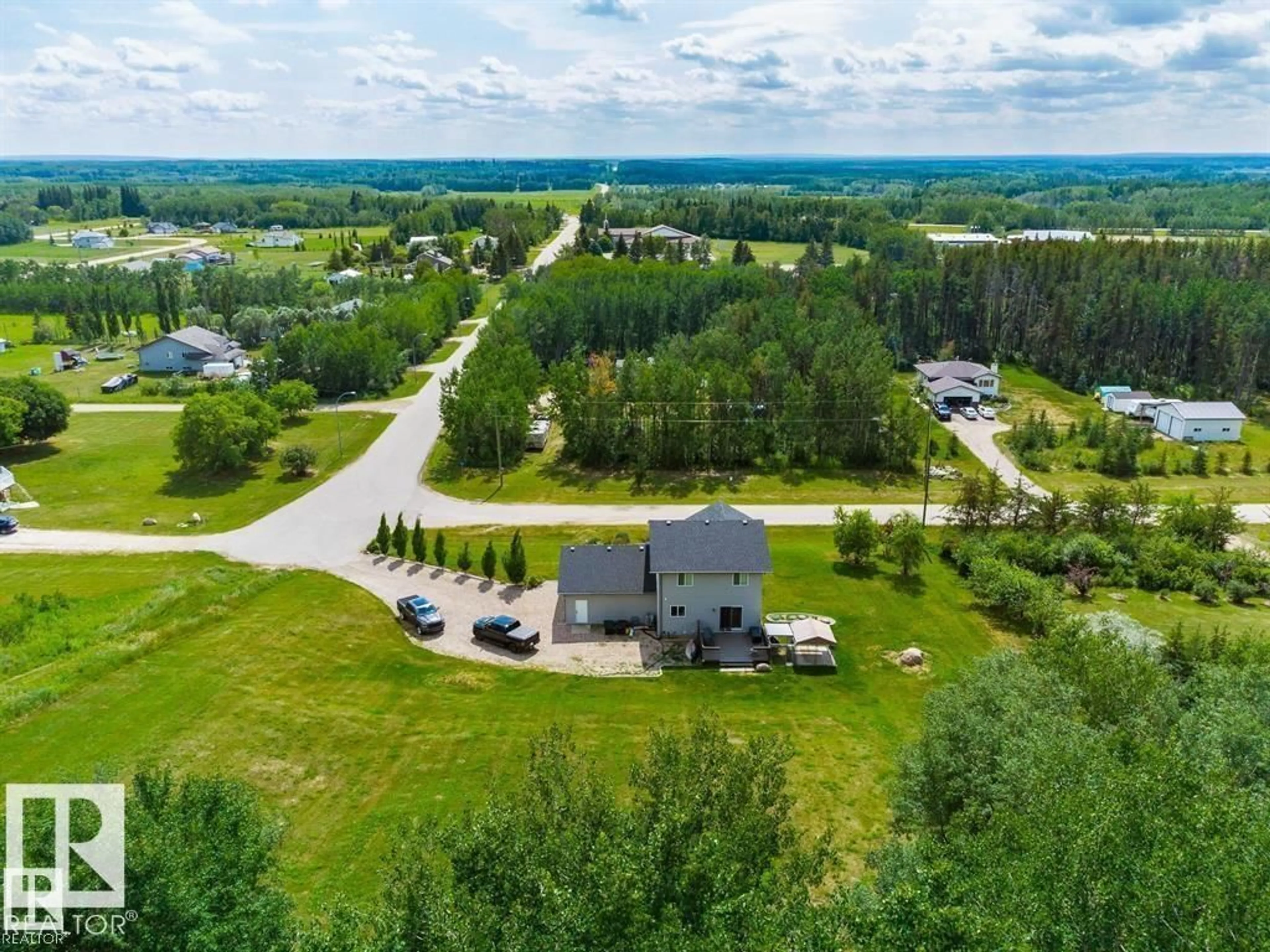 A pic from outside/outdoor area/front of a property/back of a property/a pic from drone, unknown for 5003 52 AV, Rural Bonnyville M.D. Alberta T0A0T0