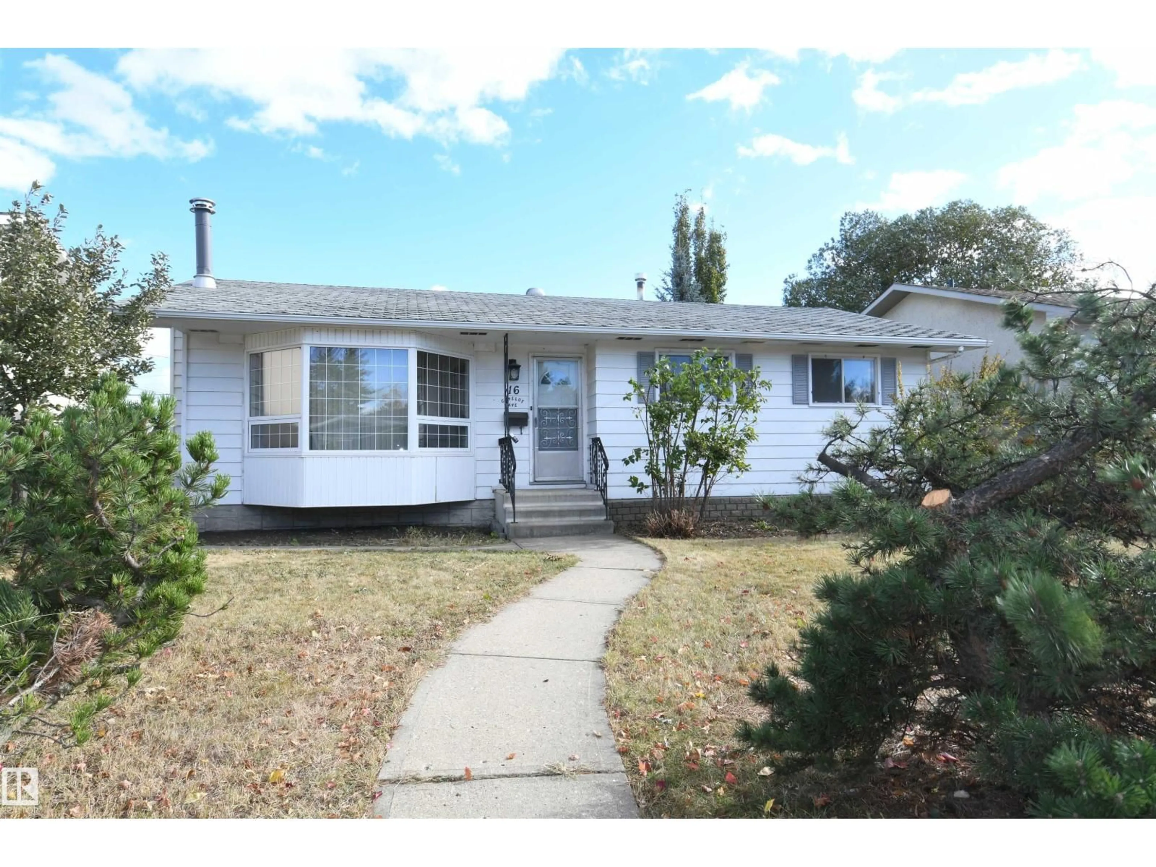 Home with vinyl exterior material, street for 16 CAMELOT AV, Leduc Alberta T9E4M3