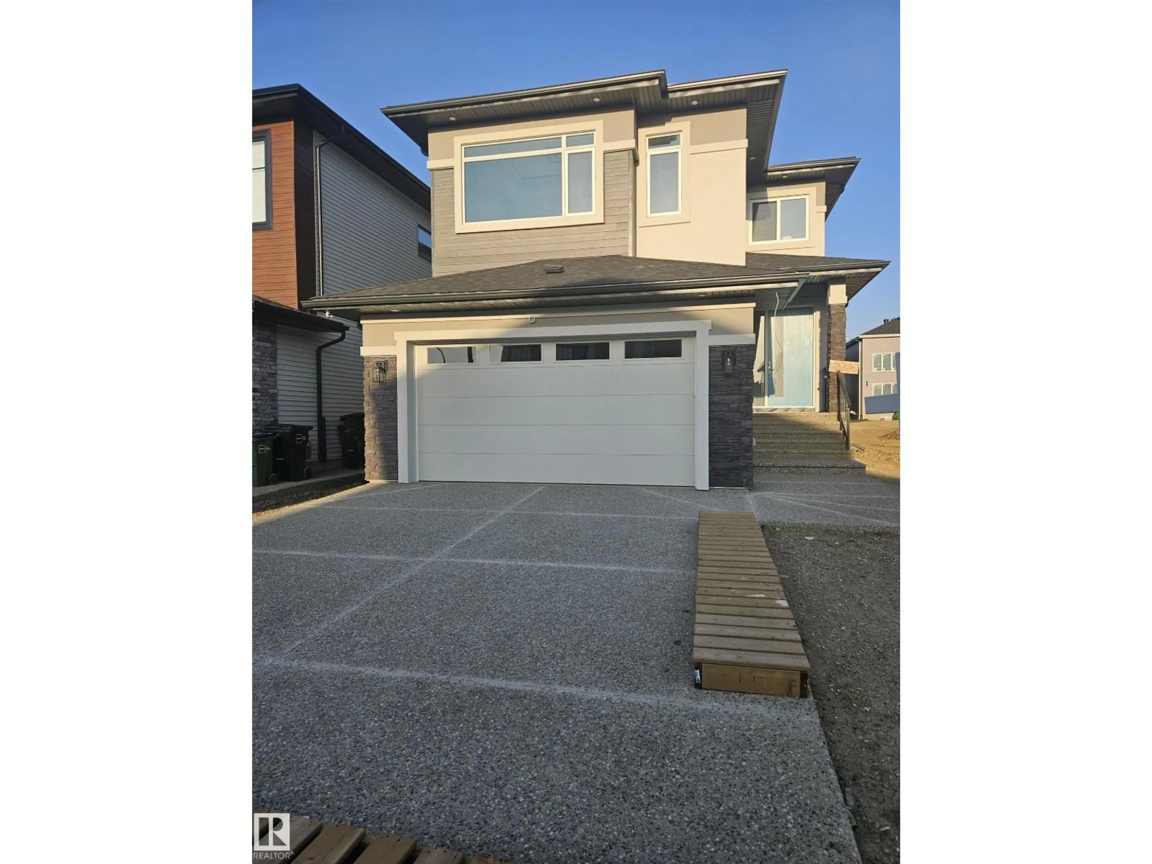 Home with vinyl exterior material, street for SW - 109 29A ST, Edmonton Alberta T6X3E1
