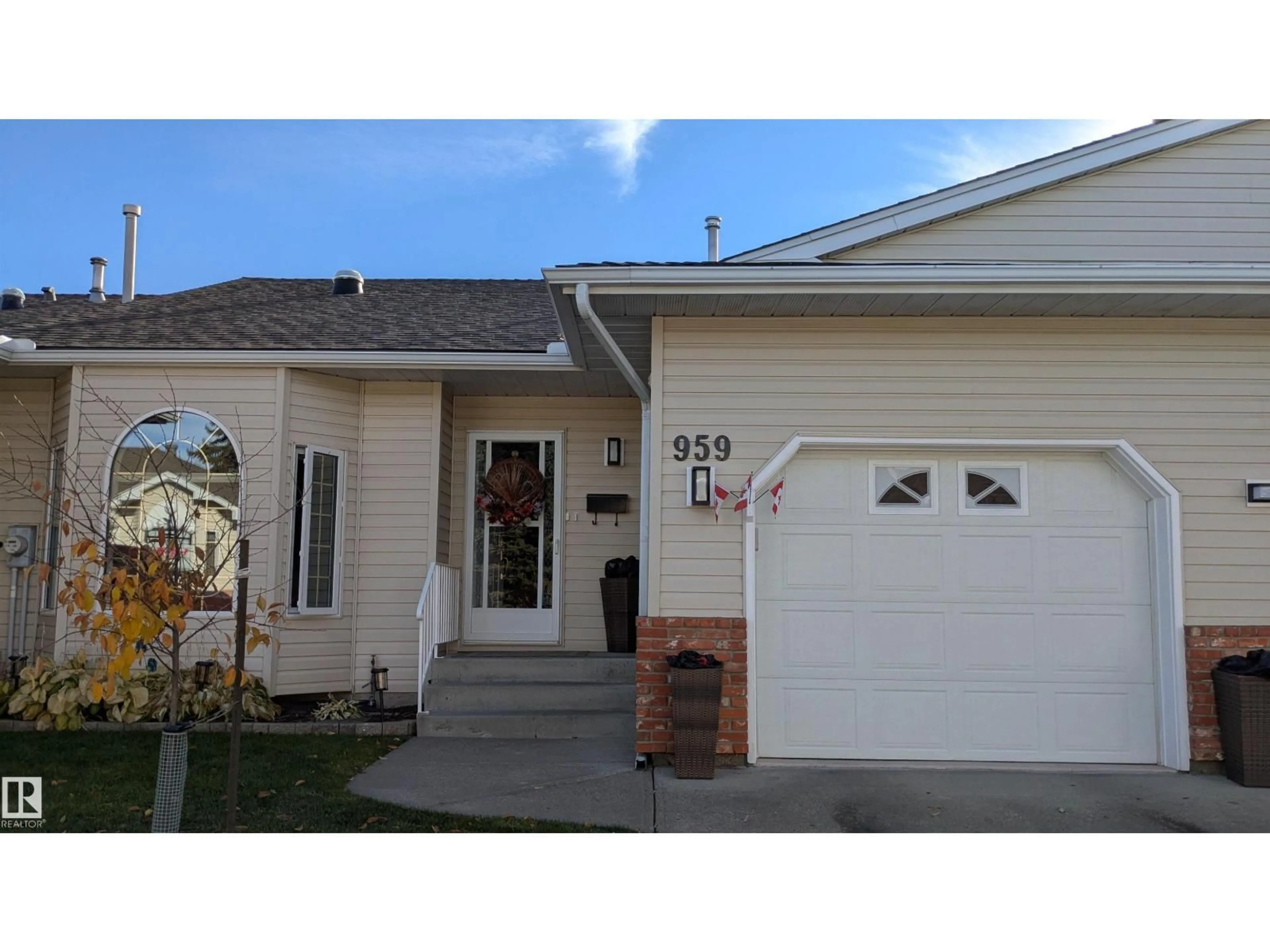 Home with vinyl exterior material, street for 959 YOUVILLE DR W, Edmonton Alberta T6L6T2
