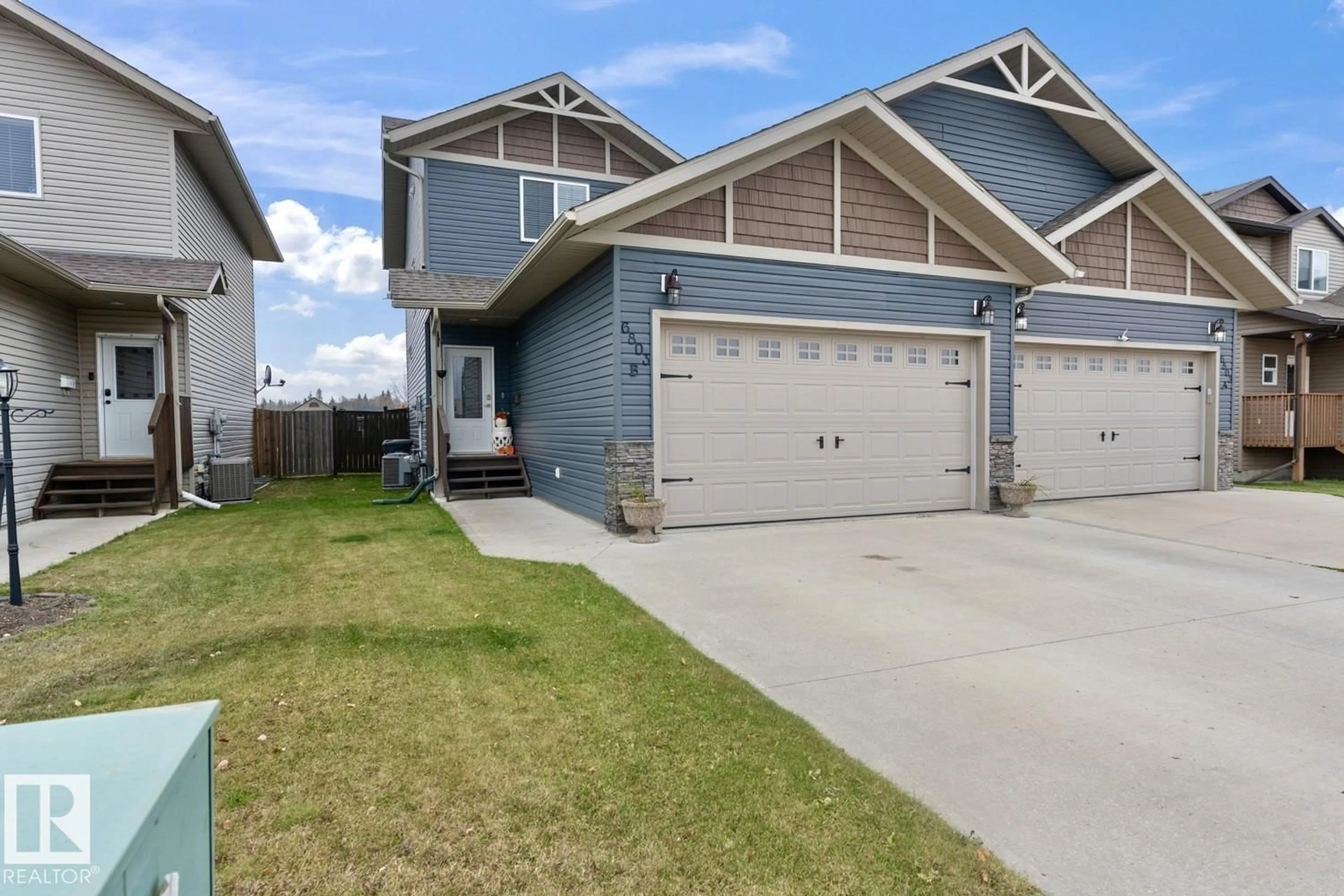 Home with vinyl exterior material, street for B - 6803 47 ST, Cold Lake Alberta T9M0B1