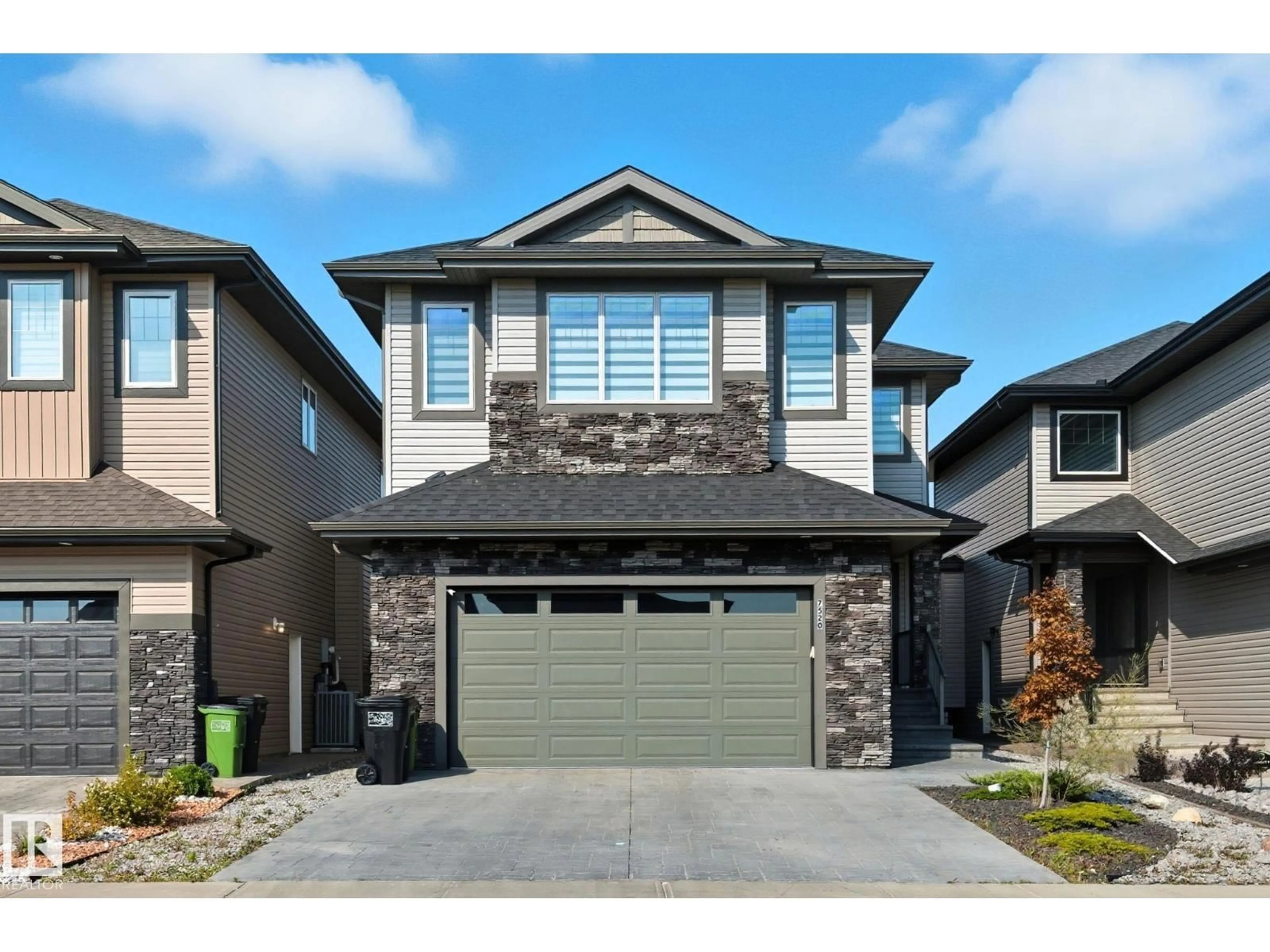 Home with vinyl exterior material, street for 7520 173 AV, Edmonton Alberta T5Z0J6
